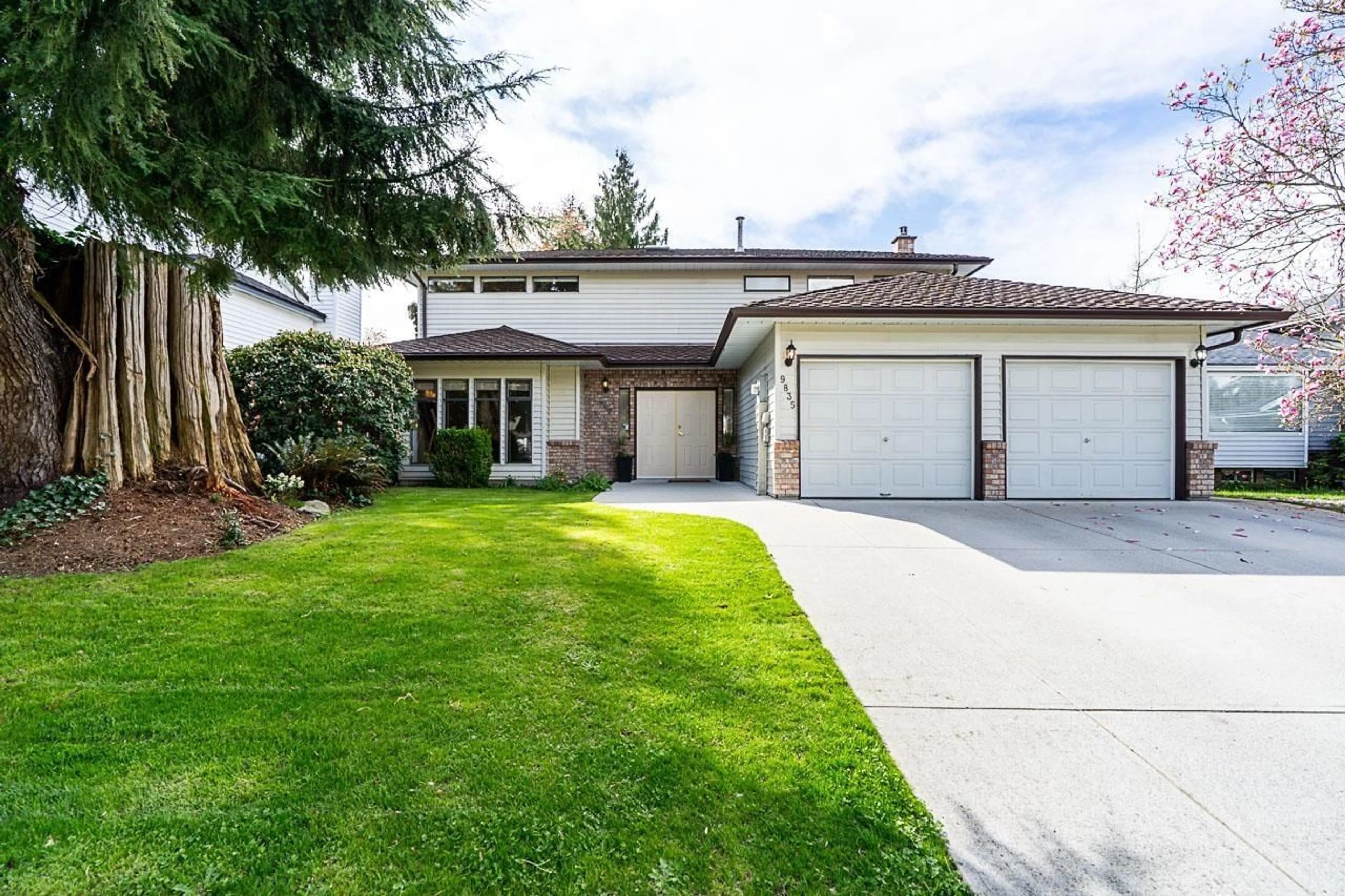 Home with vinyl exterior material, street for 9835 158A STREET, Surrey British Columbia V4N2A3