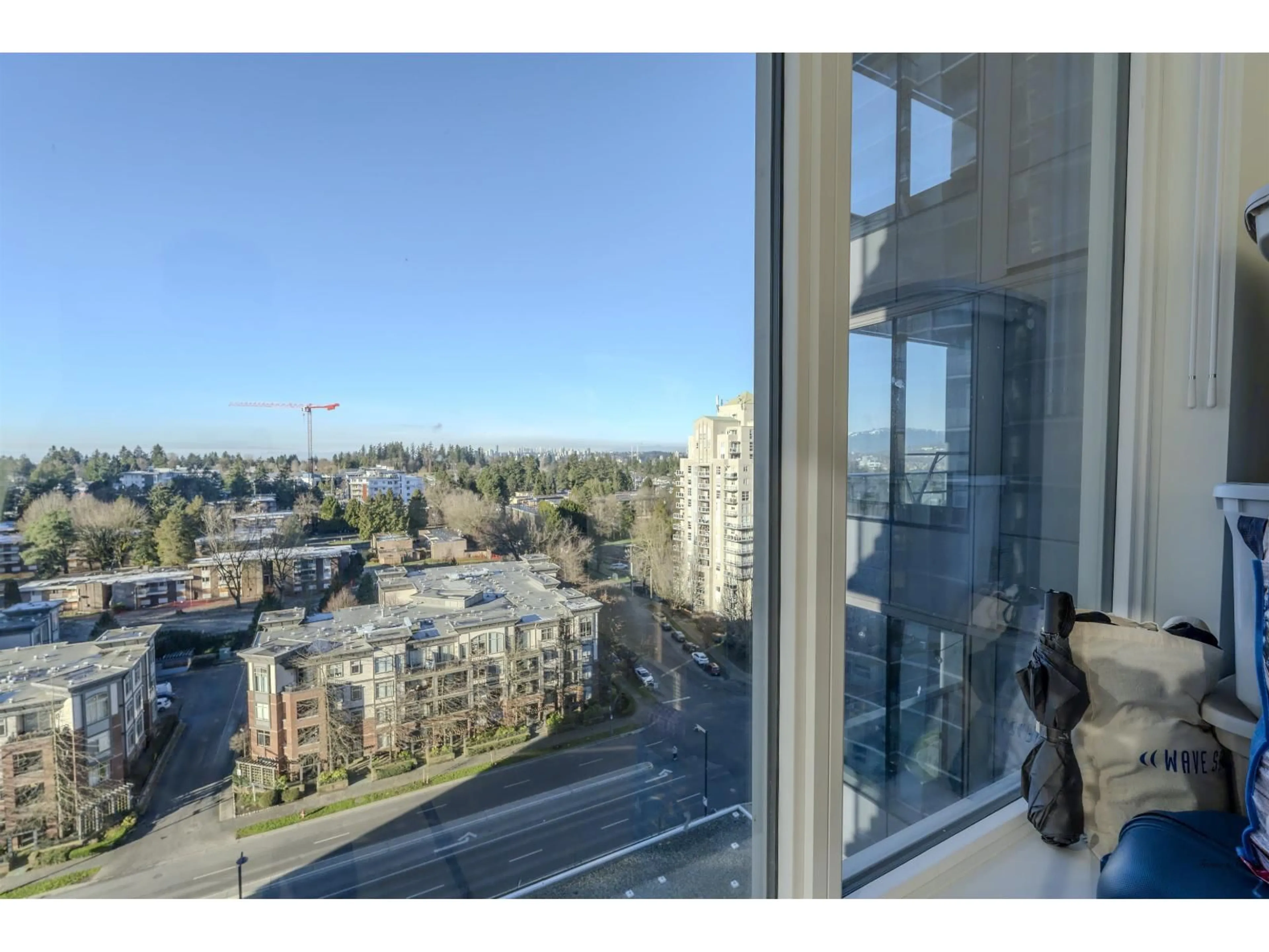 Balcony in the apartment, city buildings view from balcony for 1310 - 13428 105 AVENUE, Surrey British Columbia V3T0S6