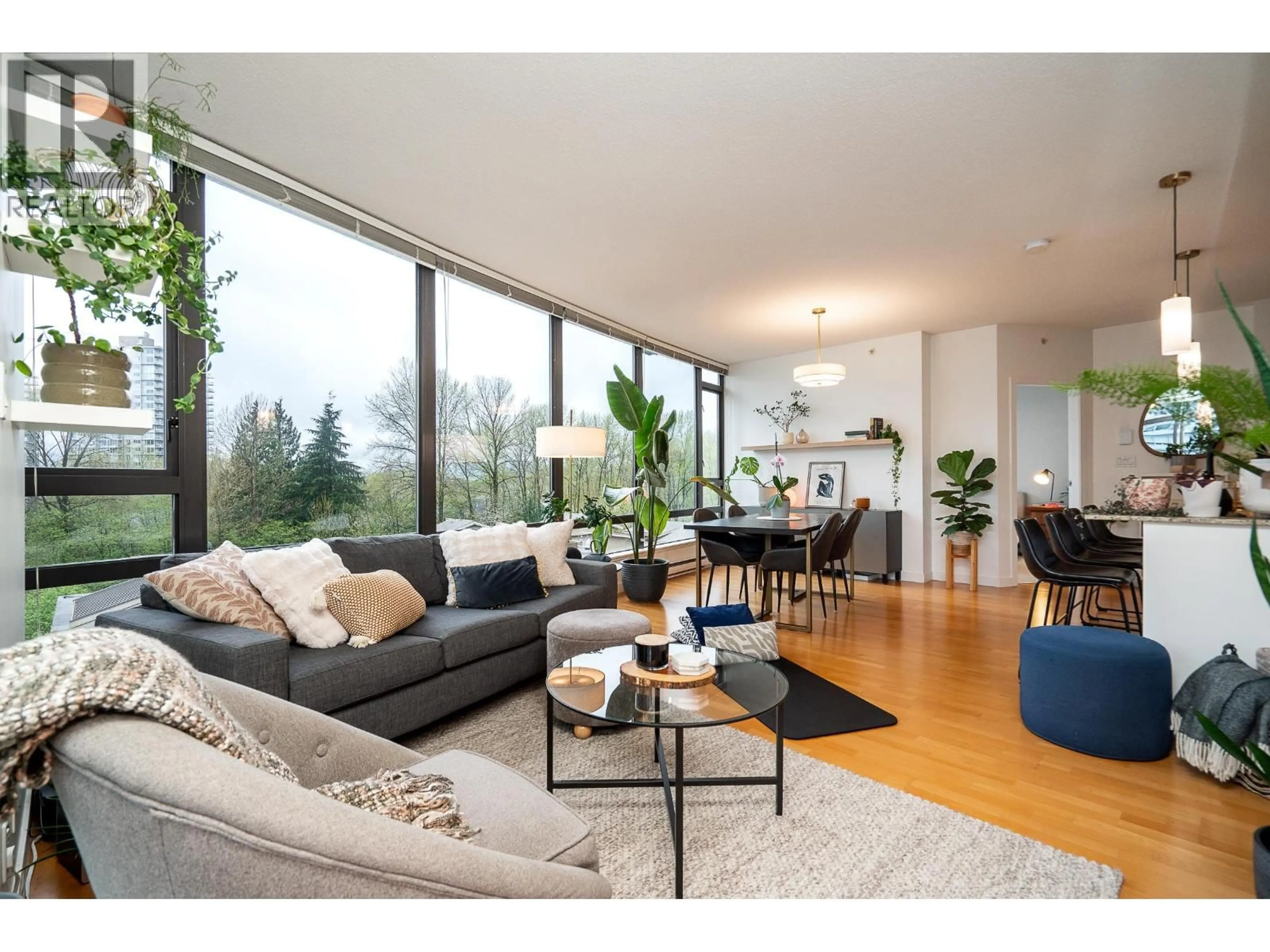 Living room with furniture, wood/laminate floor for 504 - 400 CAPILANO ROAD, Port Moody British Columbia V3H0E1