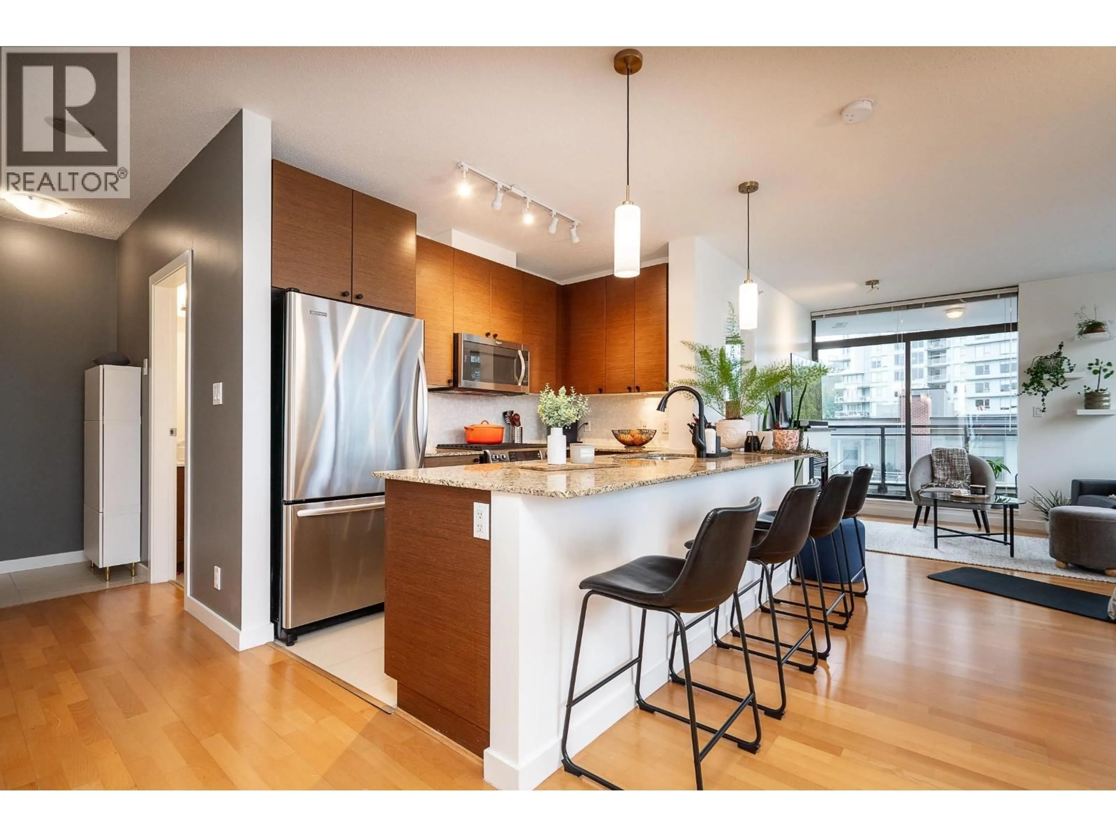 Open concept kitchen, wood/laminate floor for 504 - 400 CAPILANO ROAD, Port Moody British Columbia V3H0E1