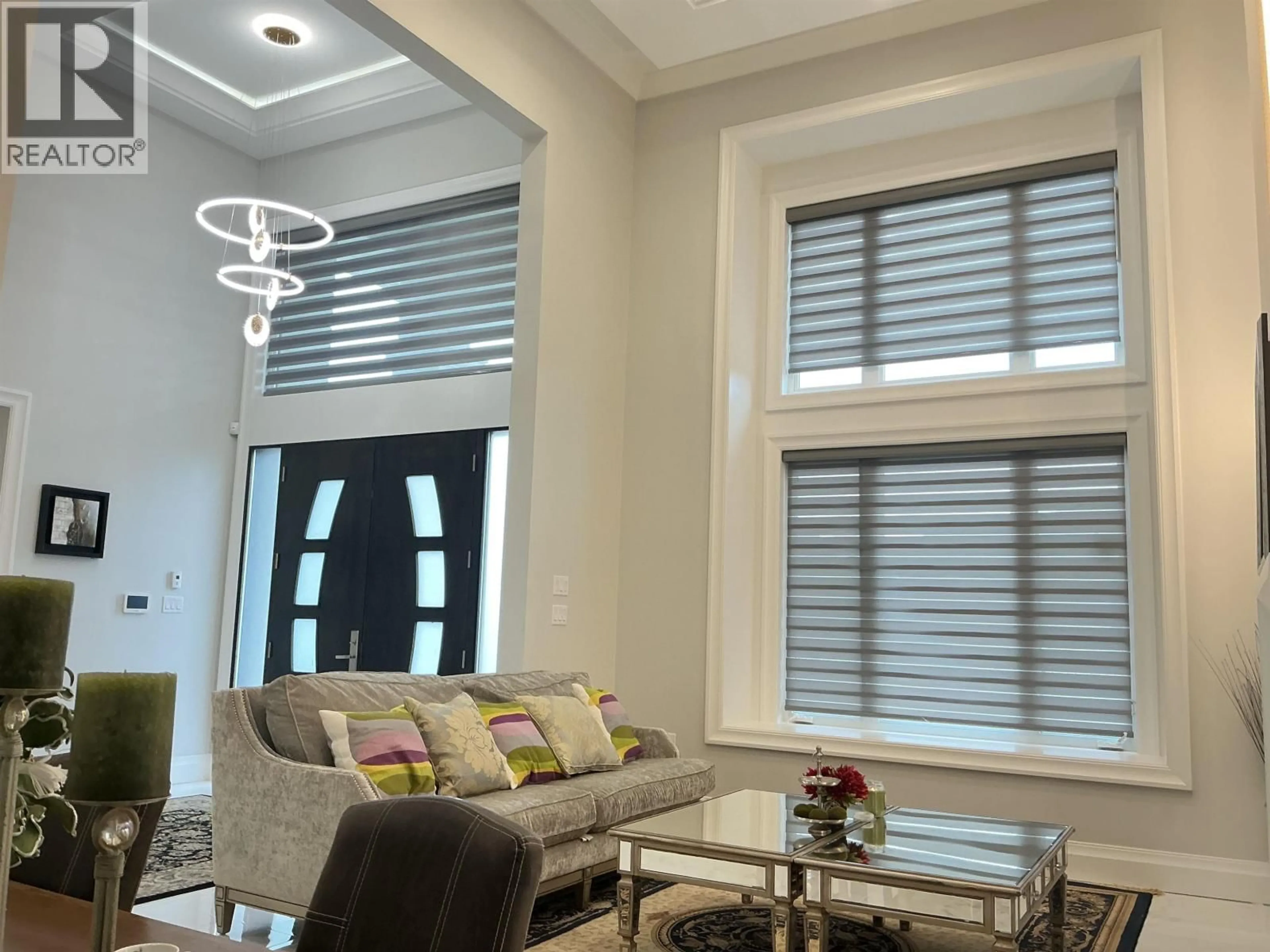 Living room with furniture, wood/laminate floor for 7351 LINDSAY ROAD, Richmond British Columbia V7C3M7