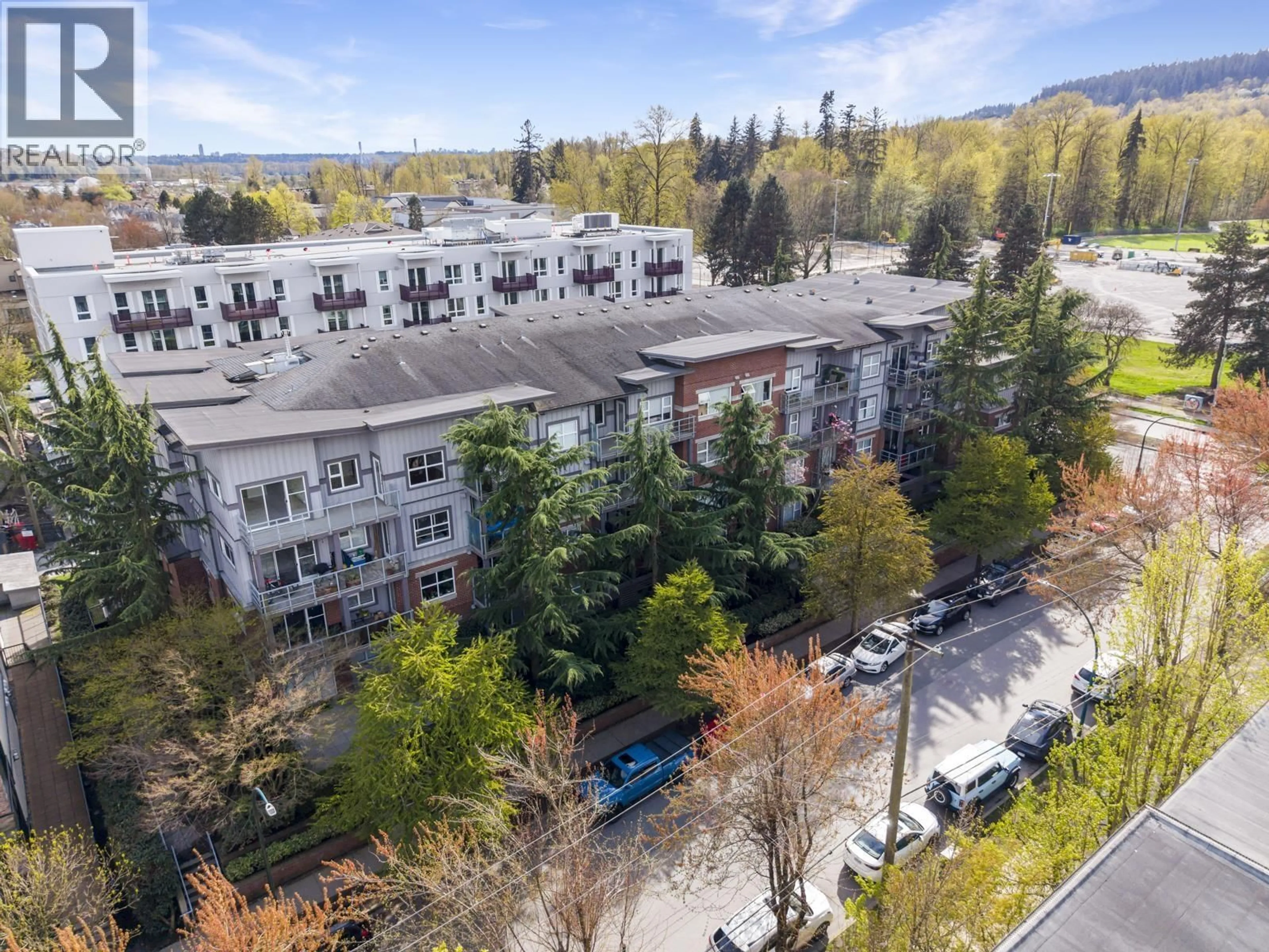 A pic from outside/outdoor area/front of a property/back of a property/a pic from drone, unknown for 403 - 2488 KELLY AVENUE, Port Coquitlam British Columbia V3C1Y4