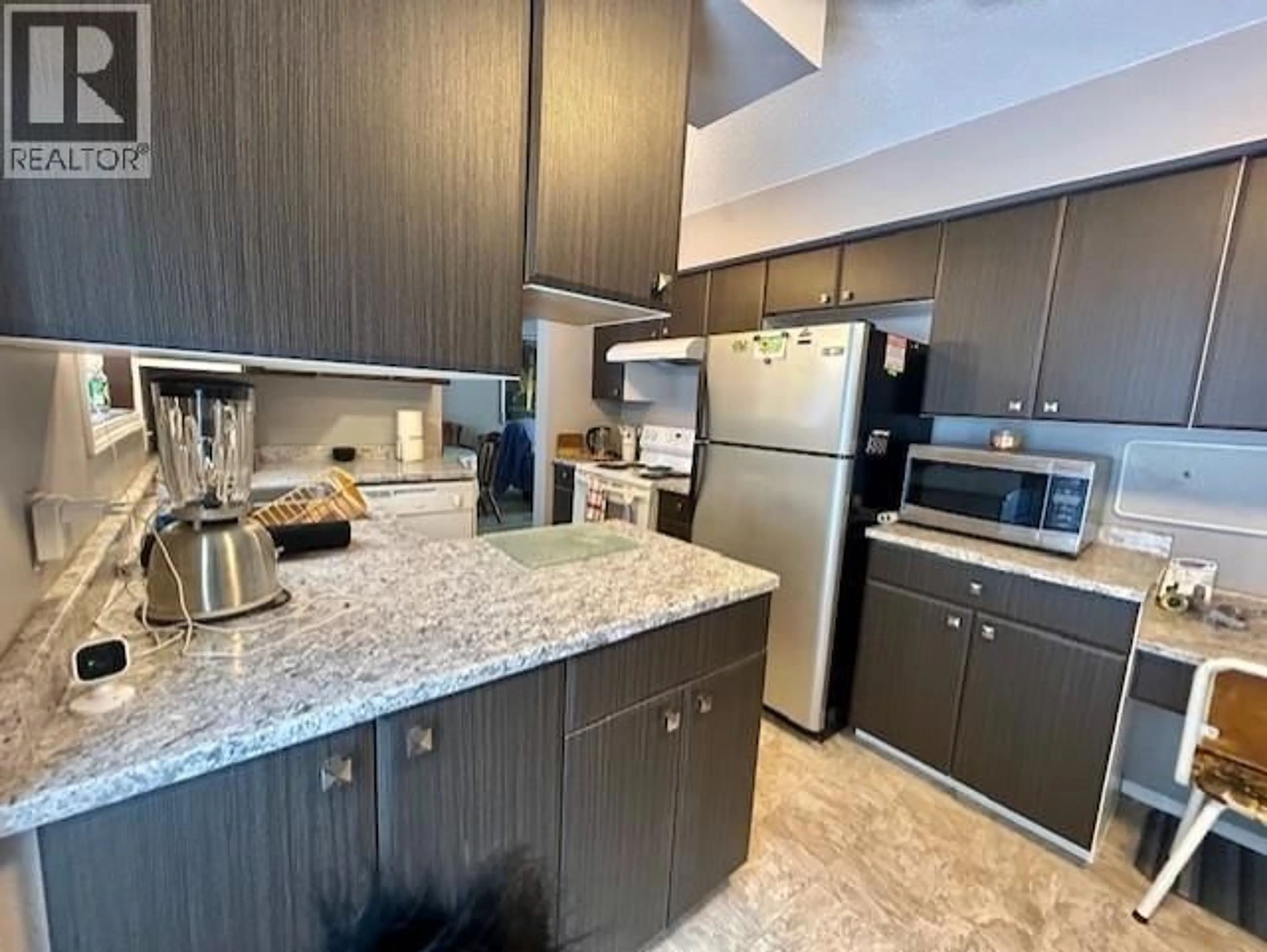 Open concept kitchen, unknown for 5735 GAIRDNER CRESCENT, Fort Nelson British Columbia V0C1R0