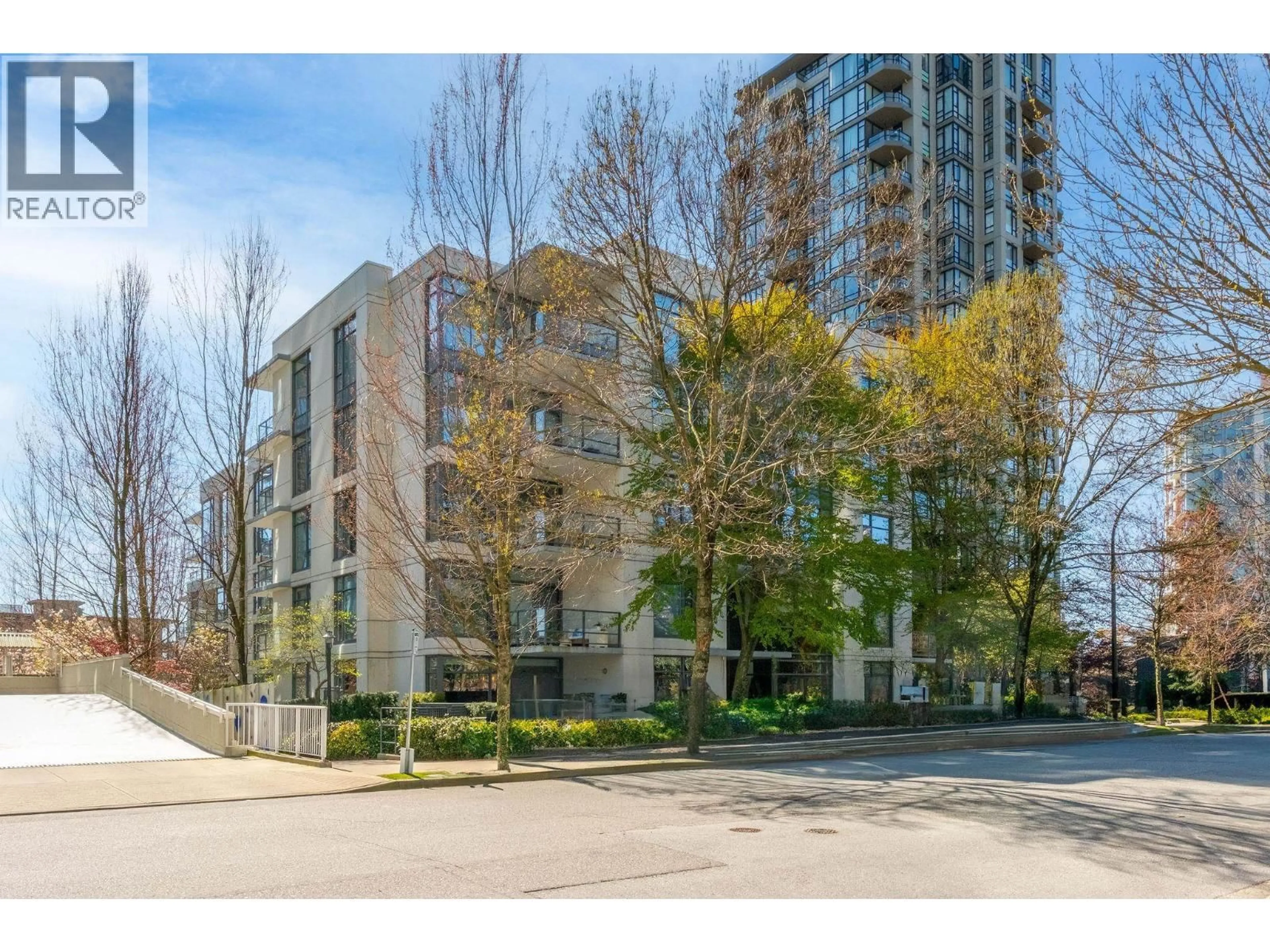 A pic from outside/outdoor area/front of a property/back of a property/a pic from drone, street for 208 - 135 2ND STREET, North Vancouver British Columbia V7M0C5