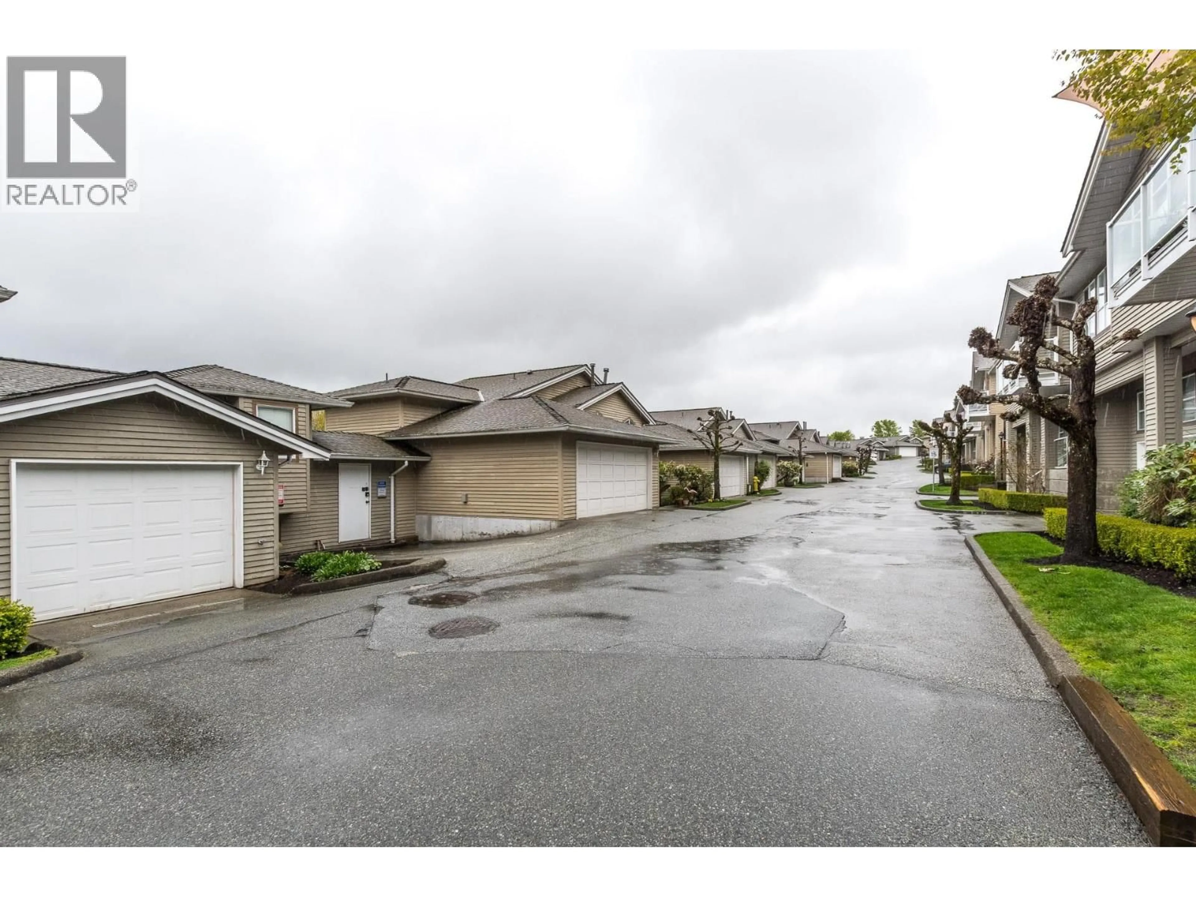 A pic from outside/outdoor area/front of a property/back of a property/a pic from drone, street for 1143 O'FLAHERTY GATE, Port Coquitlam British Columbia V3C6H2