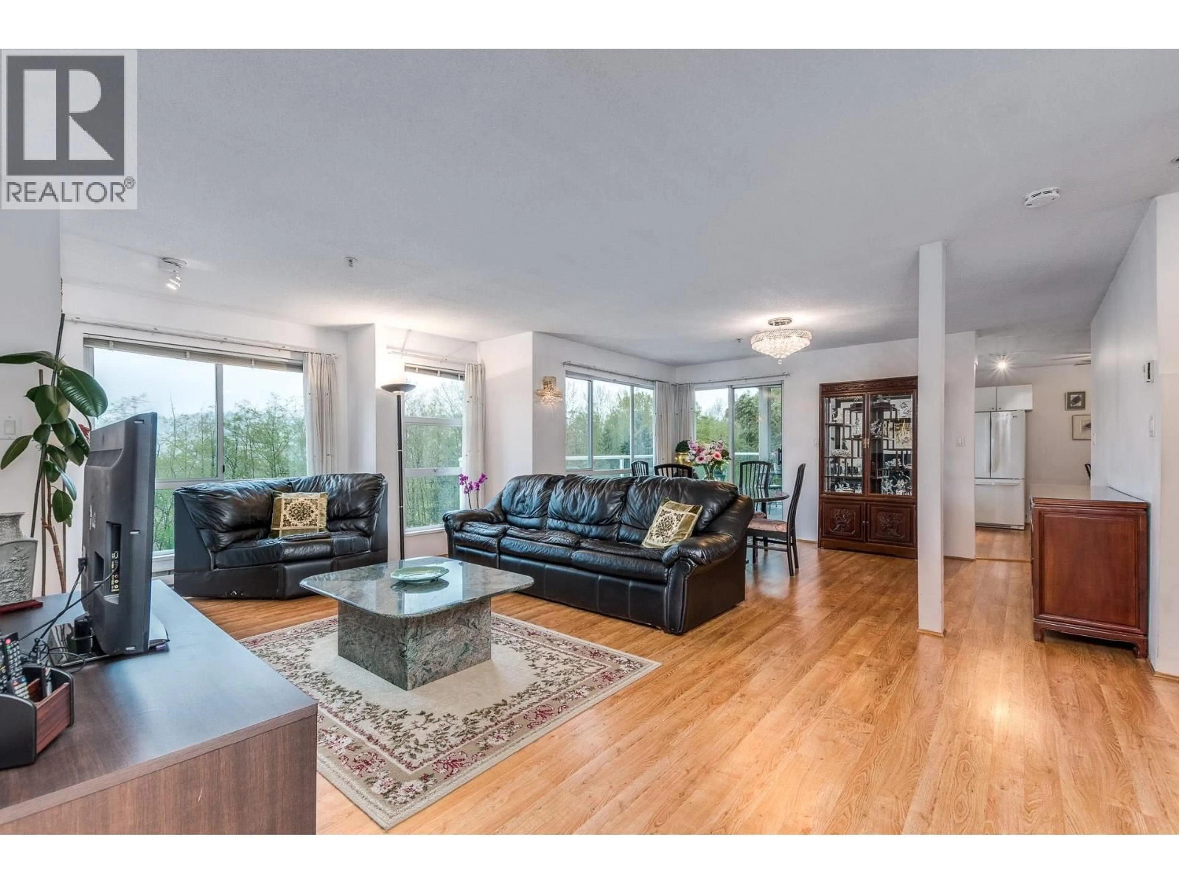 Living room with furniture, wood/laminate floor for 1143 O'FLAHERTY GATE, Port Coquitlam British Columbia V3C6H2