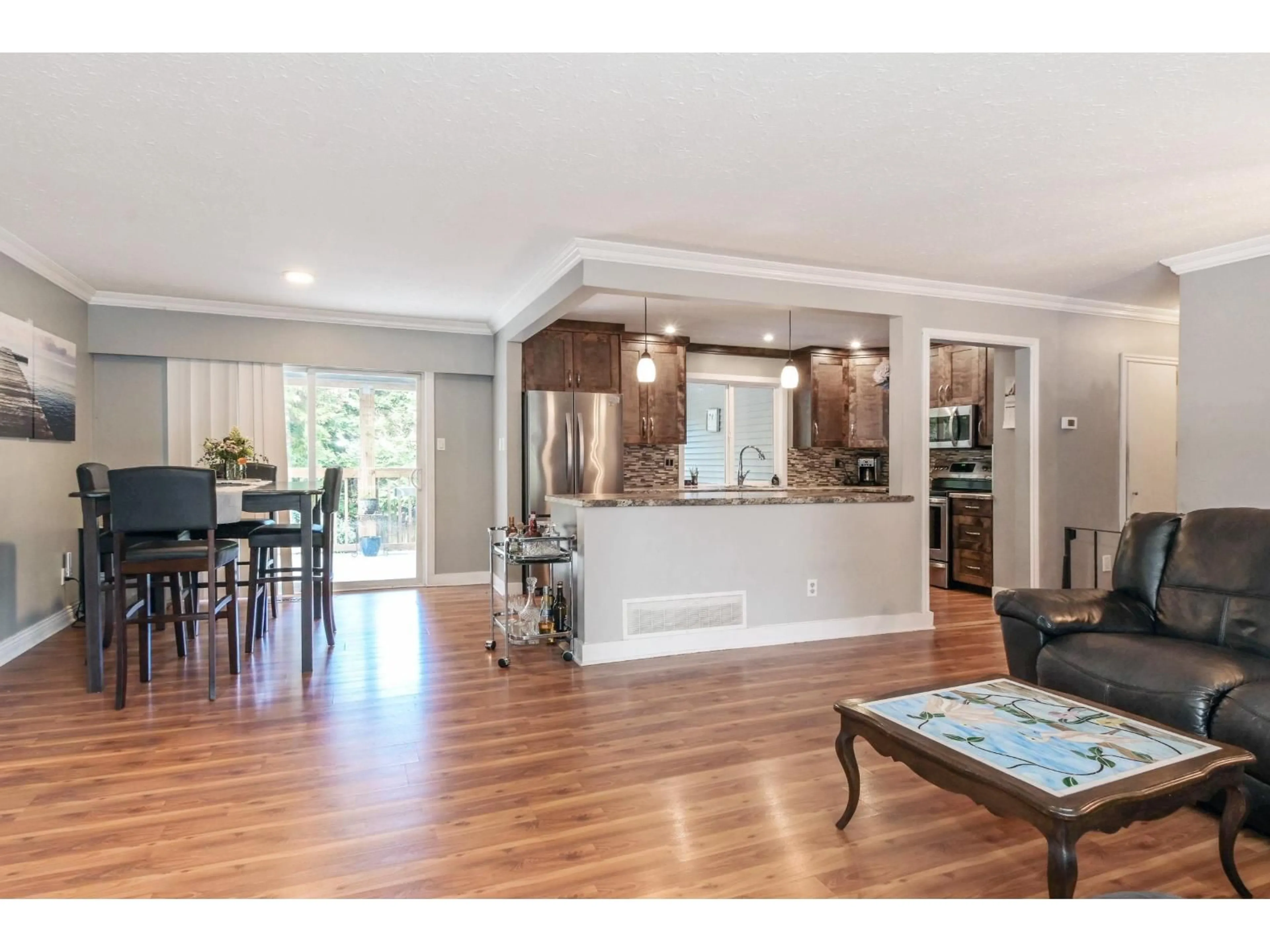 Open concept kitchen, wood/laminate floor for 4551 197A STREET, Langley British Columbia V3A1C5