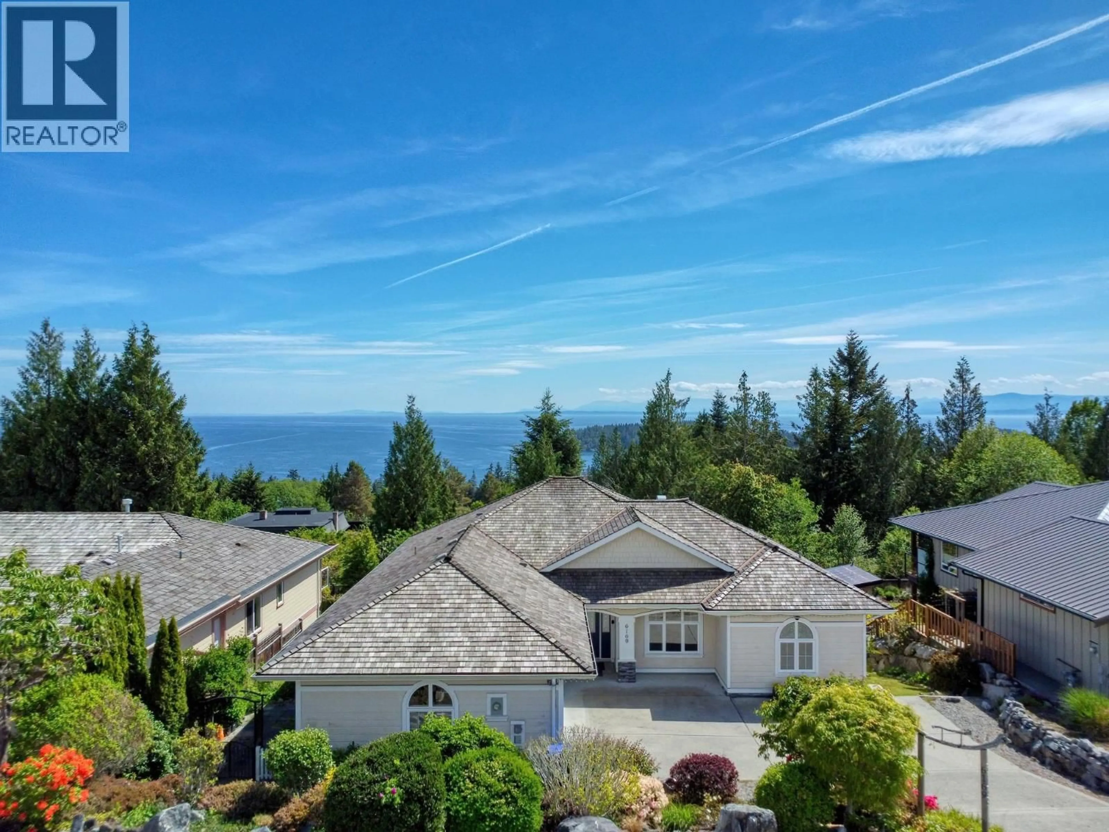 A pic from outside/outdoor area/front of a property/back of a property/a pic from drone, water/lake/river/ocean view for 6169 MIKA ROAD, Sechelt British Columbia V0N3A7