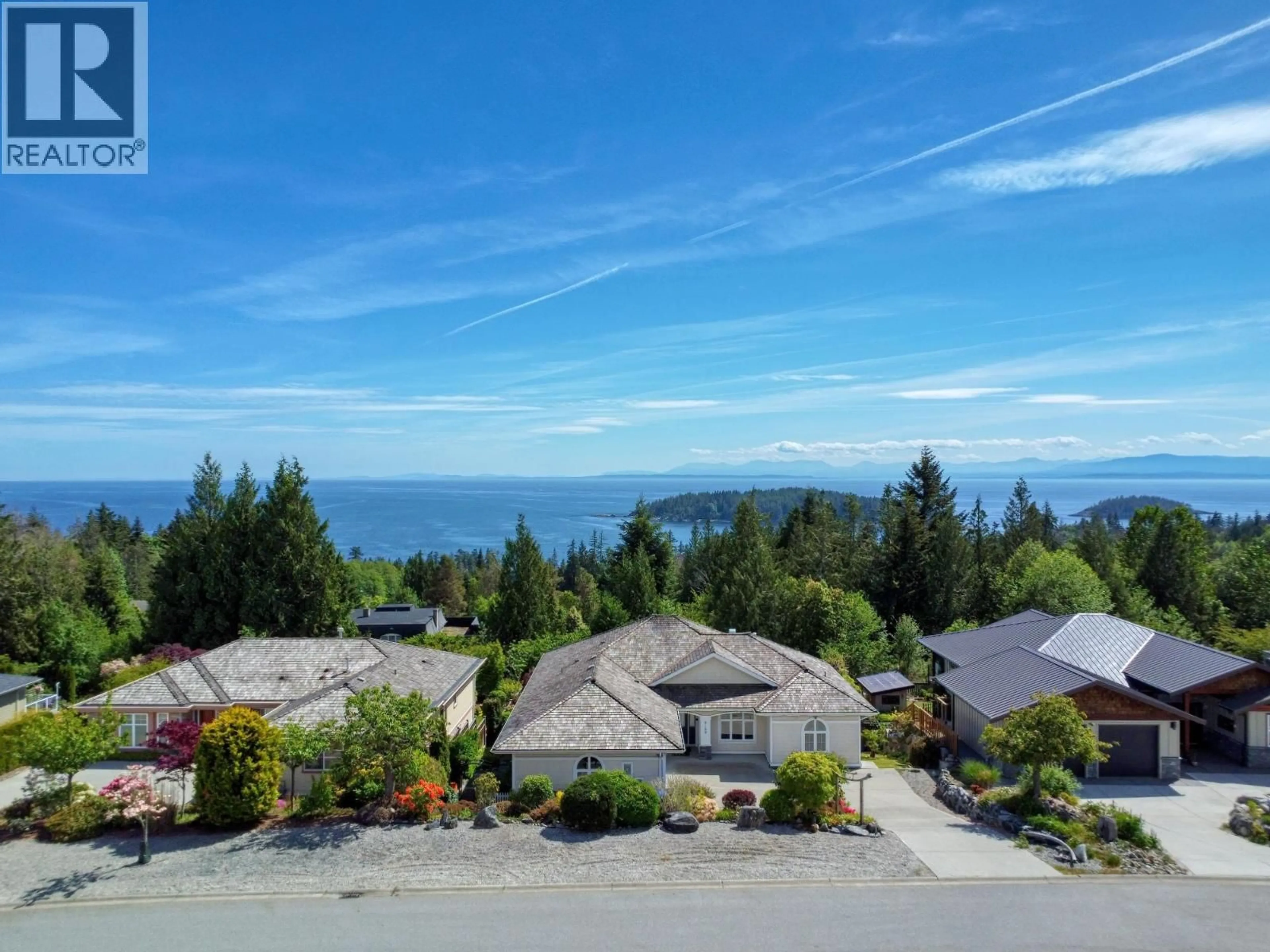 A pic from outside/outdoor area/front of a property/back of a property/a pic from drone, water/lake/river/ocean view for 6169 MIKA ROAD, Sechelt British Columbia V0N3A7