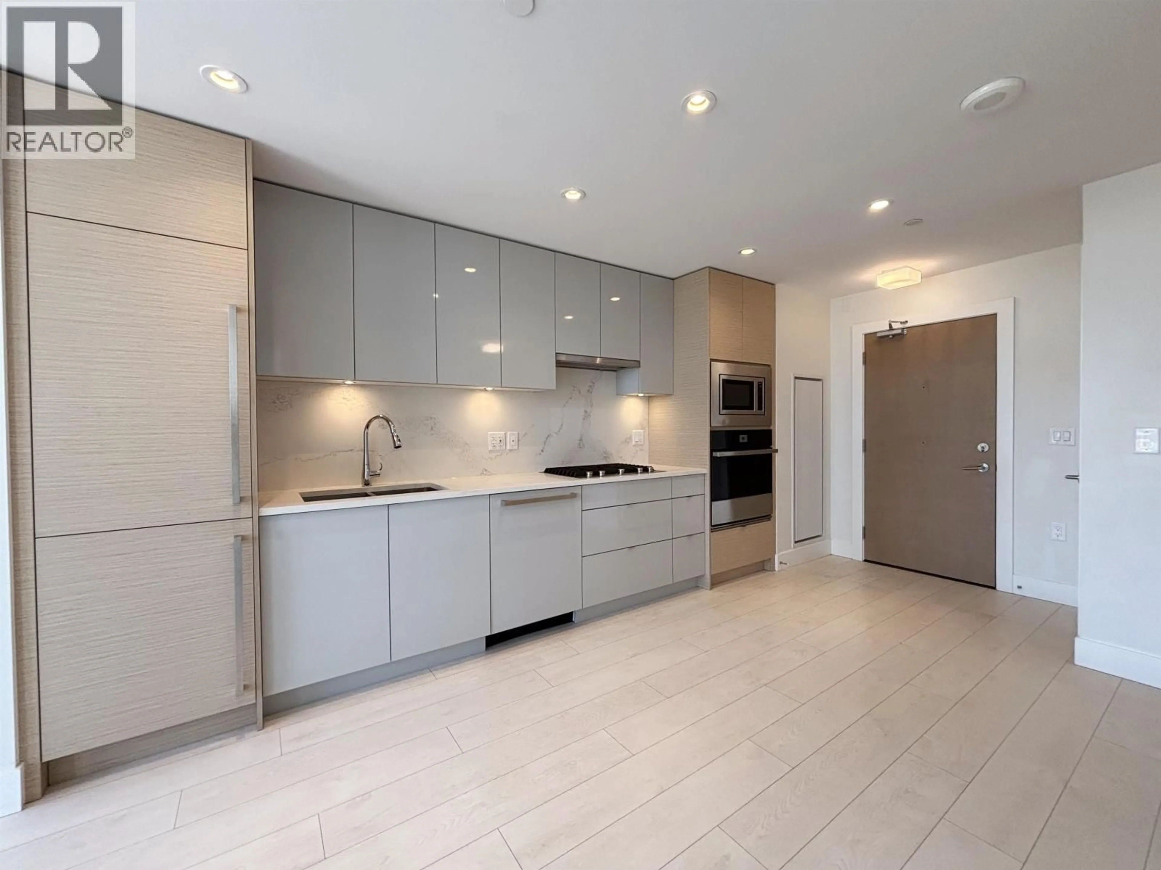 Open concept kitchen, ceramic/tile floor for 1001 - 3438 SAWMILL CRESCENT, Vancouver British Columbia V5S0E3