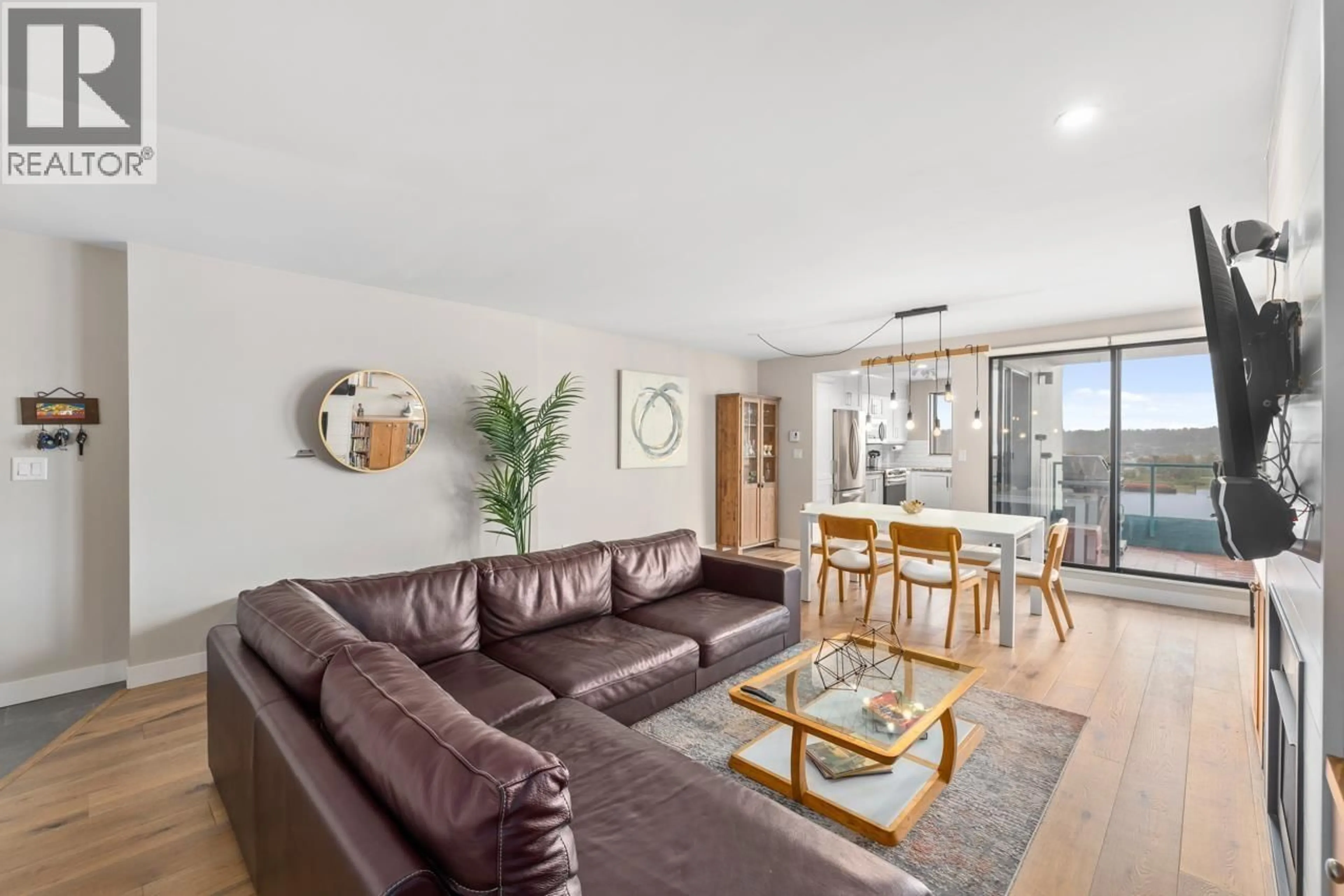 Living room with furniture, wood/laminate floor for 502 - 410 CARNARVON STREET, New Westminster British Columbia V3L5N9