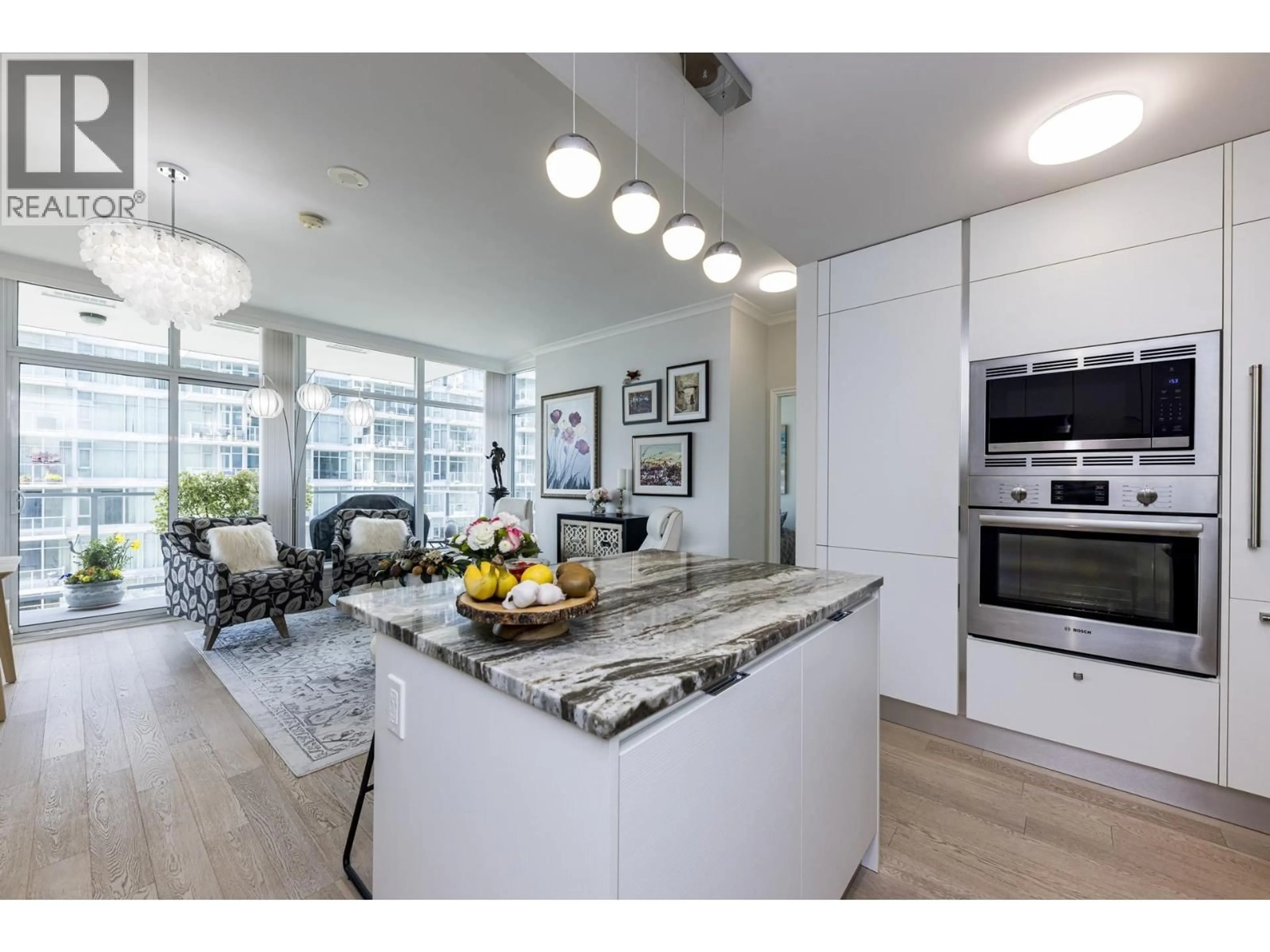 Open concept kitchen, unknown for 303 - 185 VICTORY SHIP WAY, North Vancouver British Columbia V7L0G2