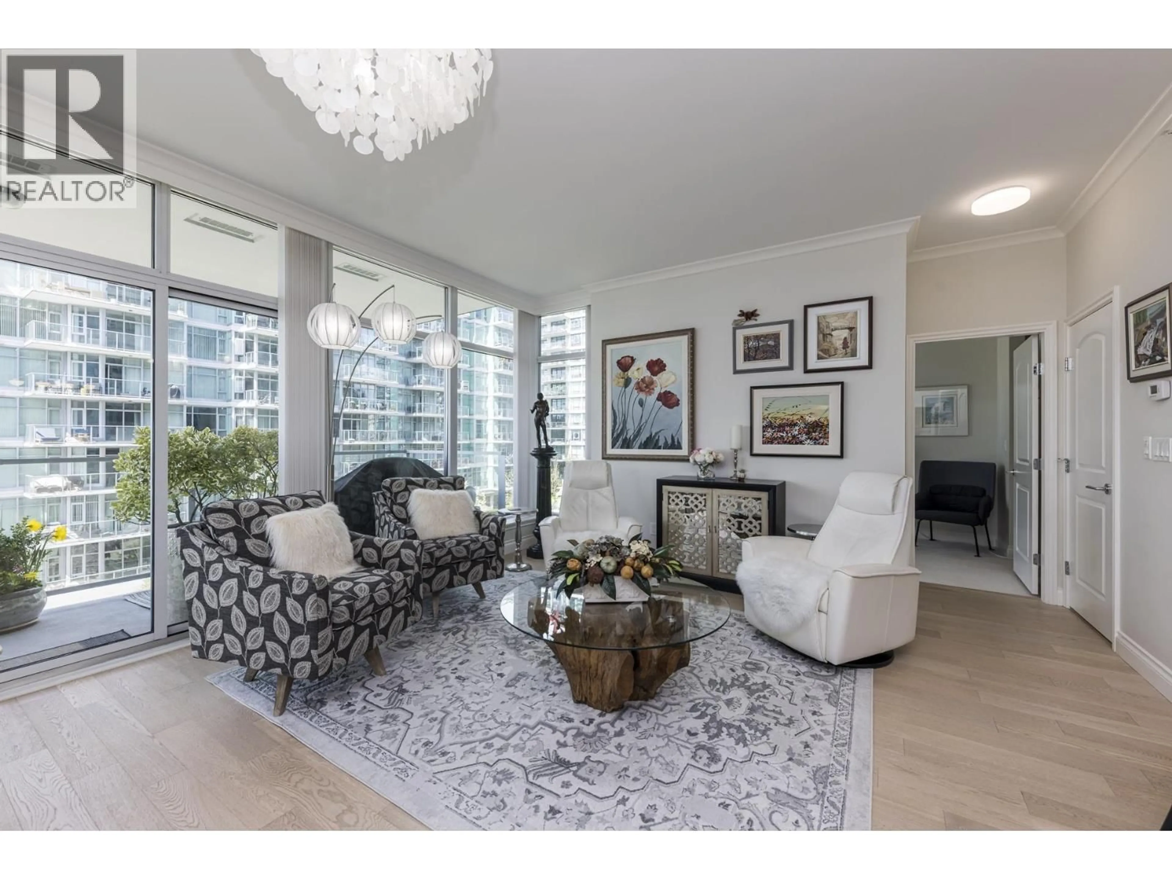 Living room with furniture, unknown for 303 - 185 VICTORY SHIP WAY, North Vancouver British Columbia V7L0G2