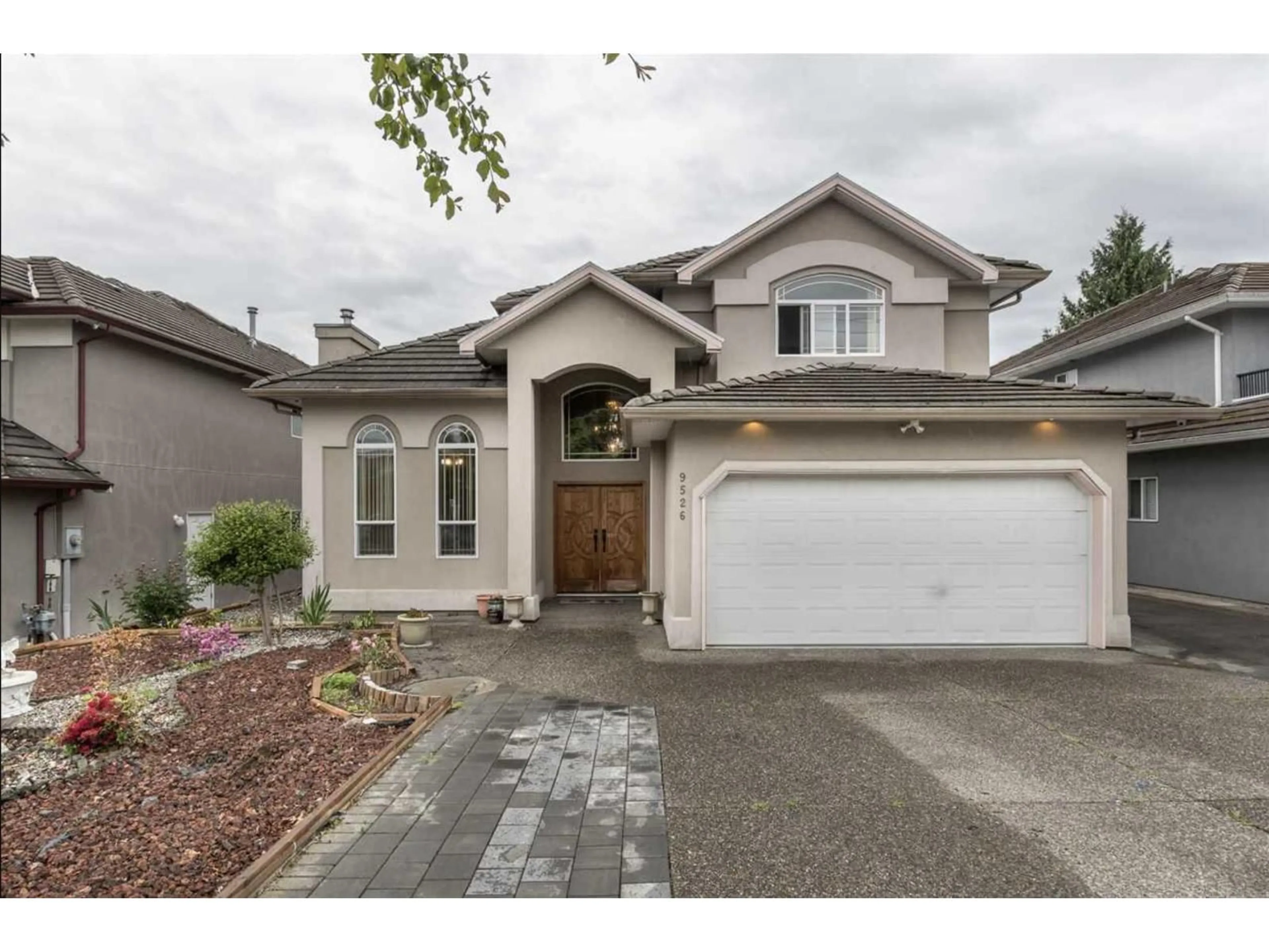 Home with vinyl exterior material, street for 9526 124 STREET, Surrey British Columbia V3V4S4