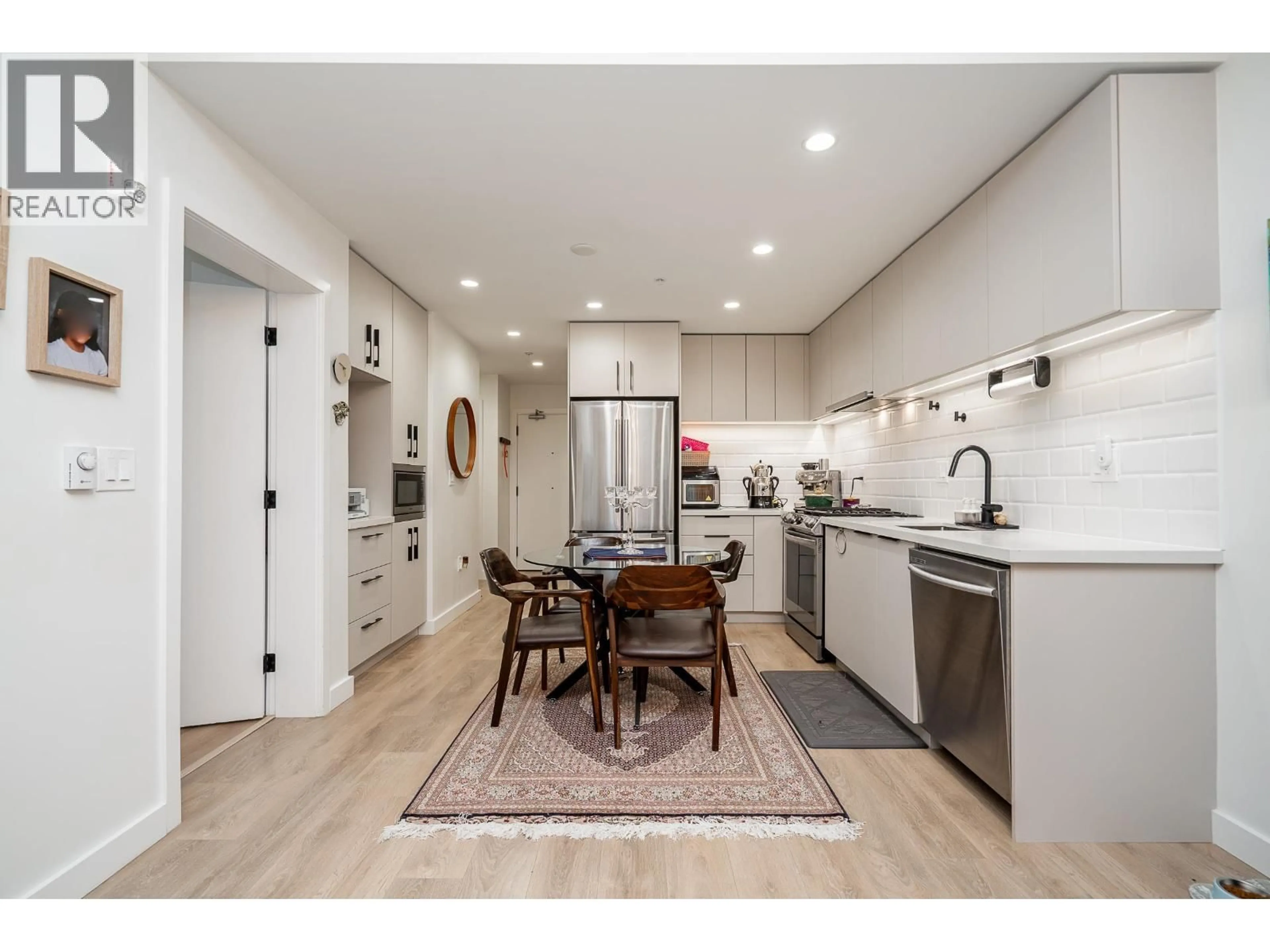 Open concept kitchen, unknown for 112 - 3038 ST. GEORGE STREET, Port Moody British Columbia V3H0L3