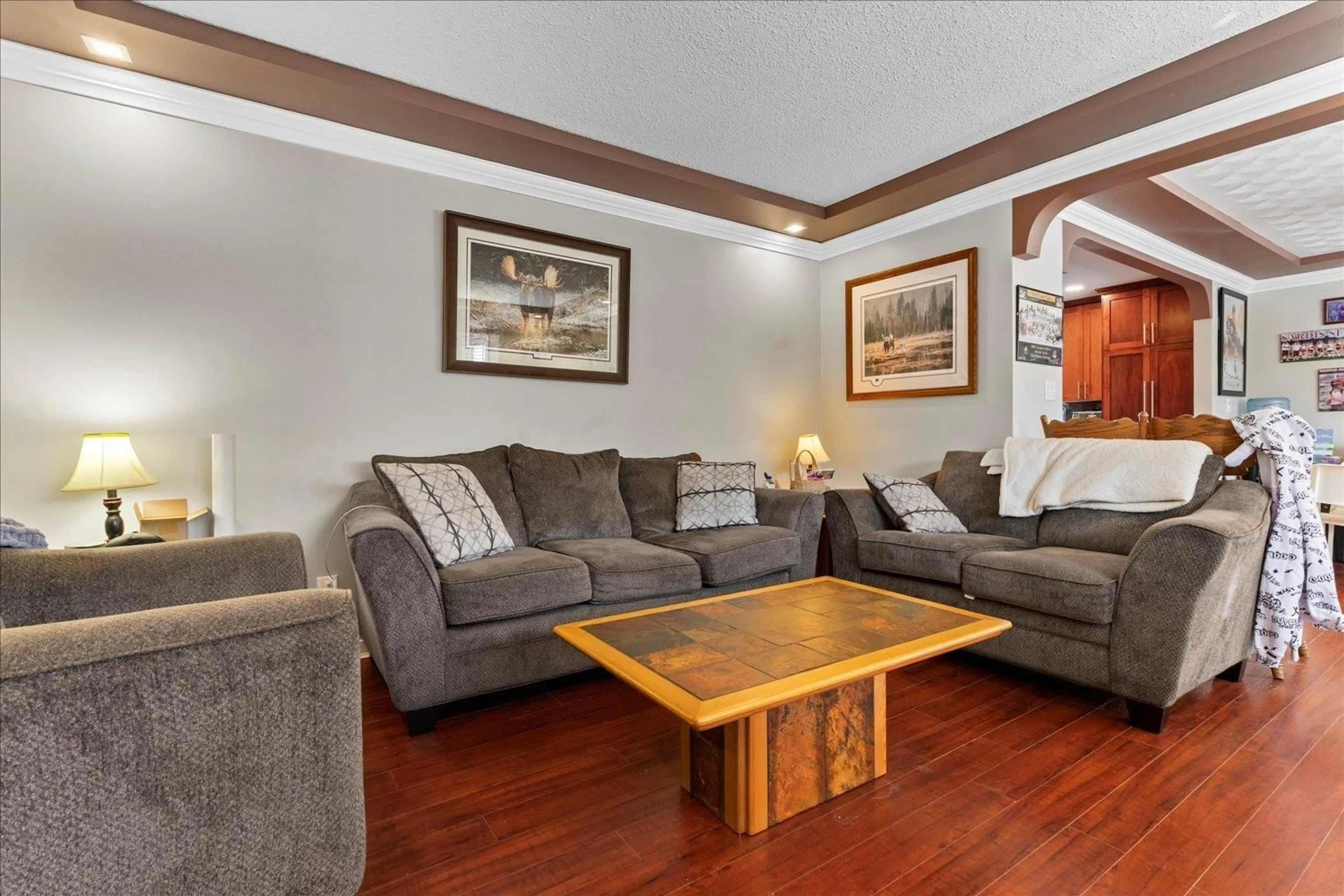 Living room with furniture, wood/laminate floor for 6279 SILVERTHORNE ROAD, Chilliwack British Columbia V2R2N2