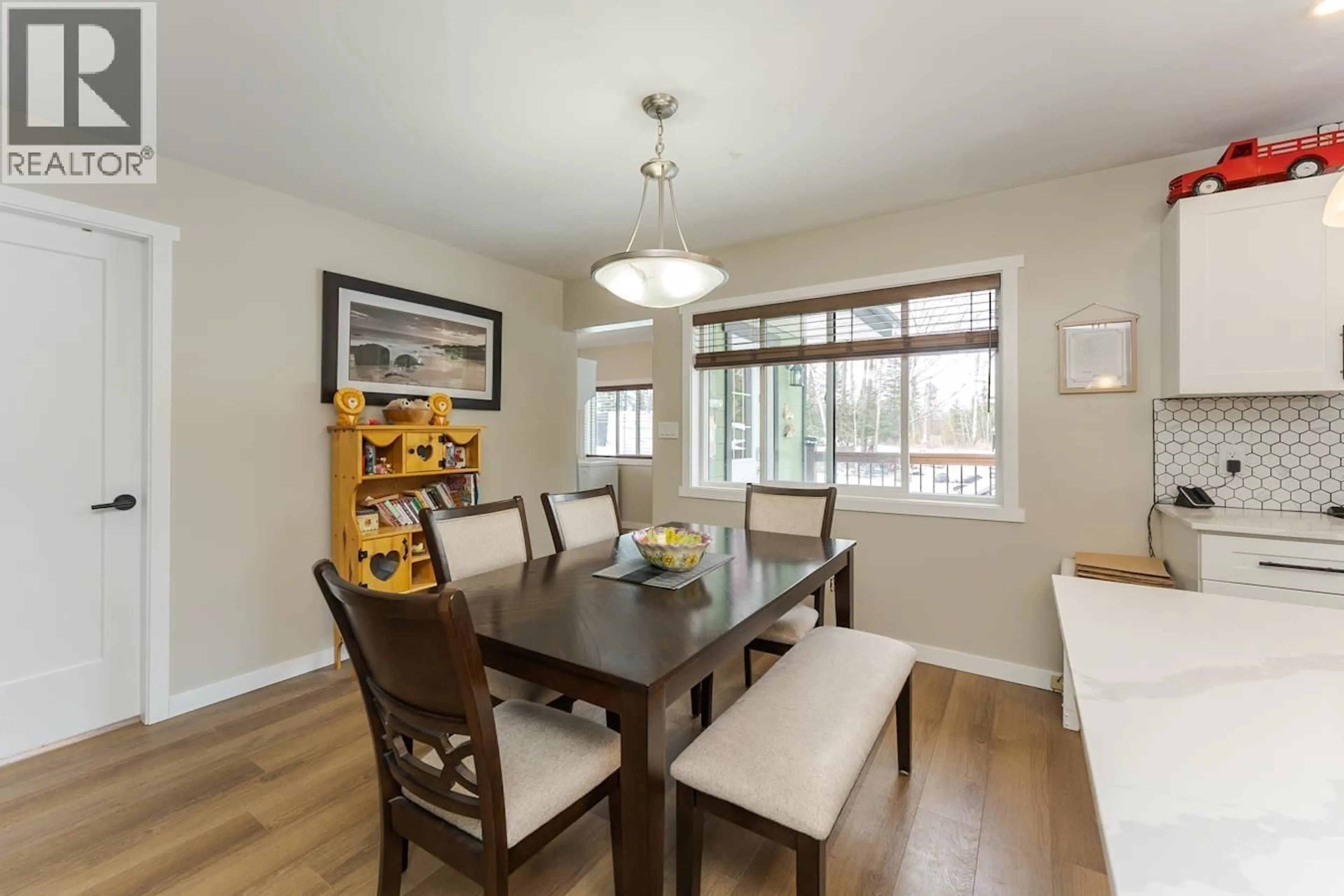 Dining room, wood/laminate floor for 8785 LYNN DRIVE, Prince George British Columbia V2N6G4