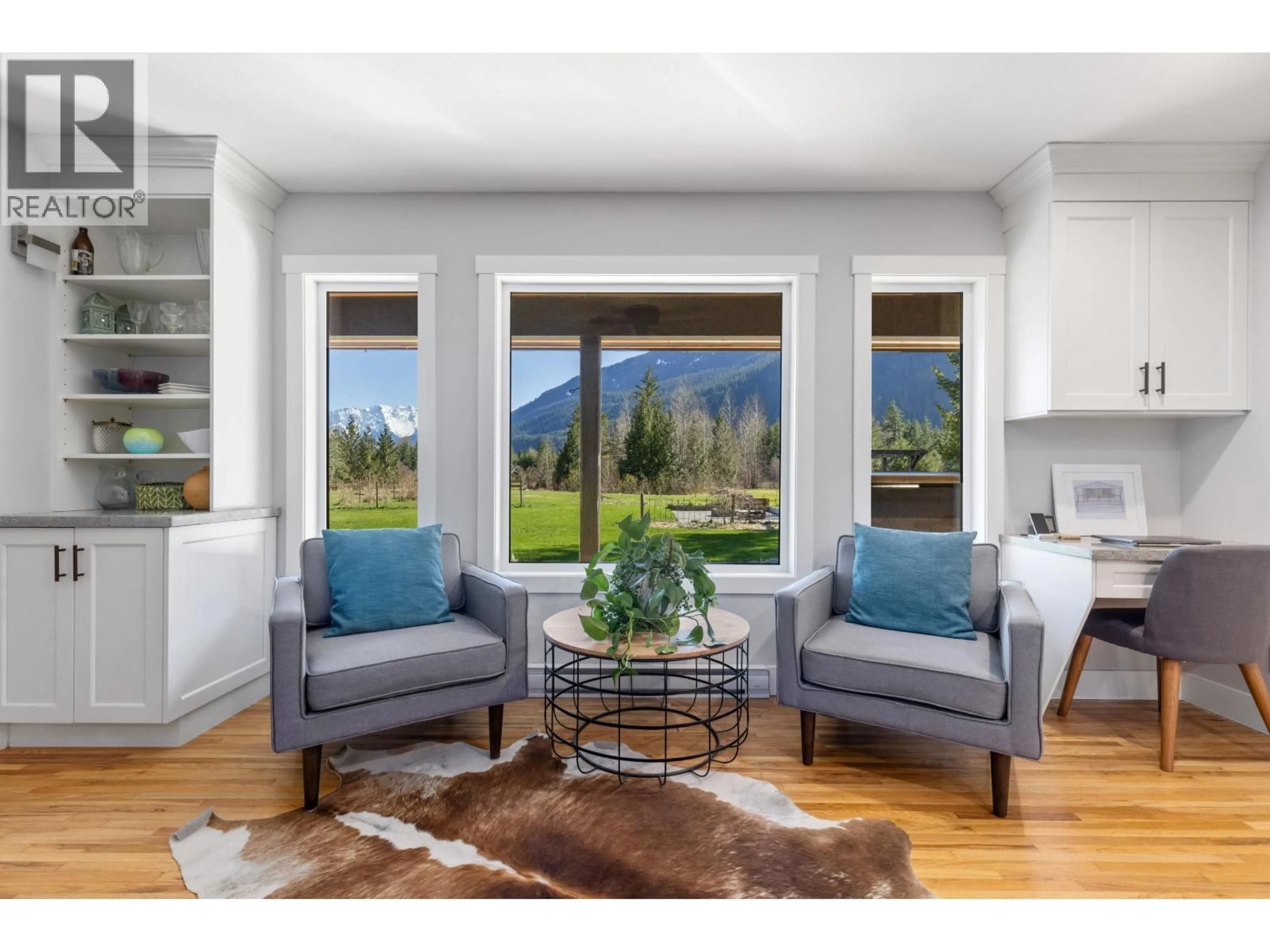 Living room with furniture, wood/laminate floor for 780 GREEN ROAD, Pemberton British Columbia V0N2L2