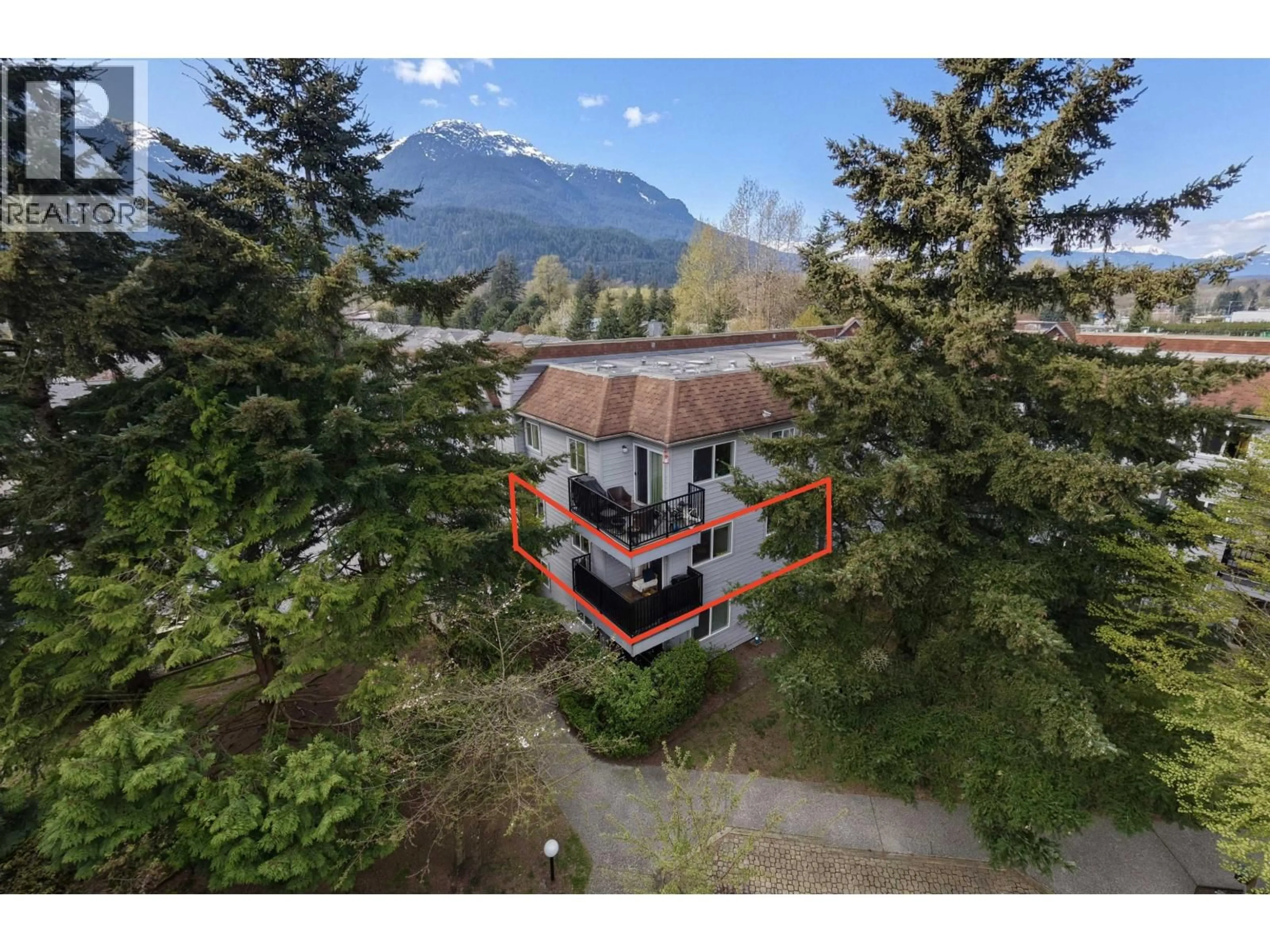 A pic from outside/outdoor area/front of a property/back of a property/a pic from drone, mountain view for D207 - 40160 WILLOW CRESCENT, Squamish British Columbia V8B0M2