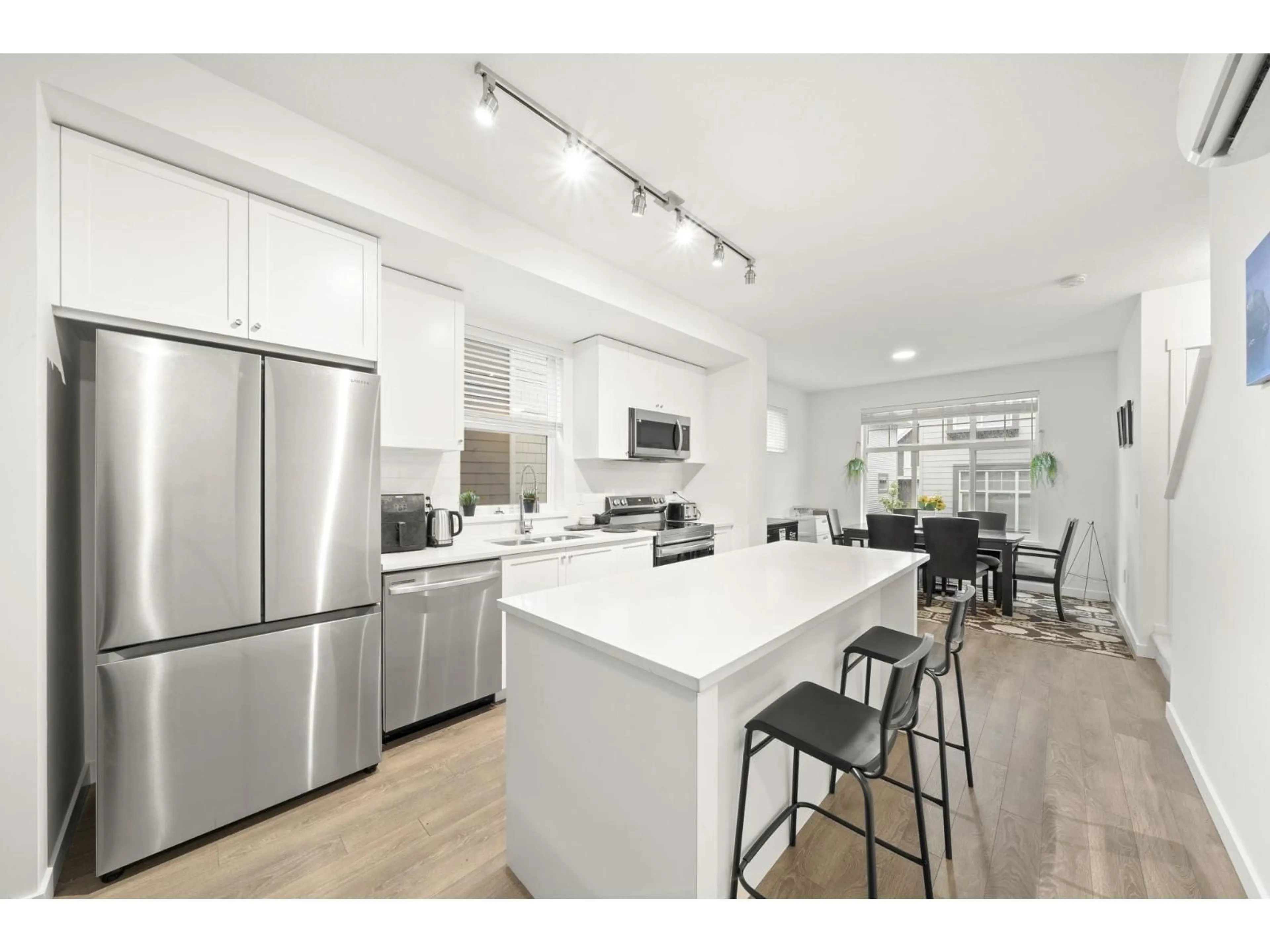 Open concept kitchen, unknown for 156 - 15778 85 AVENUE, Surrey British Columbia V4N6W8