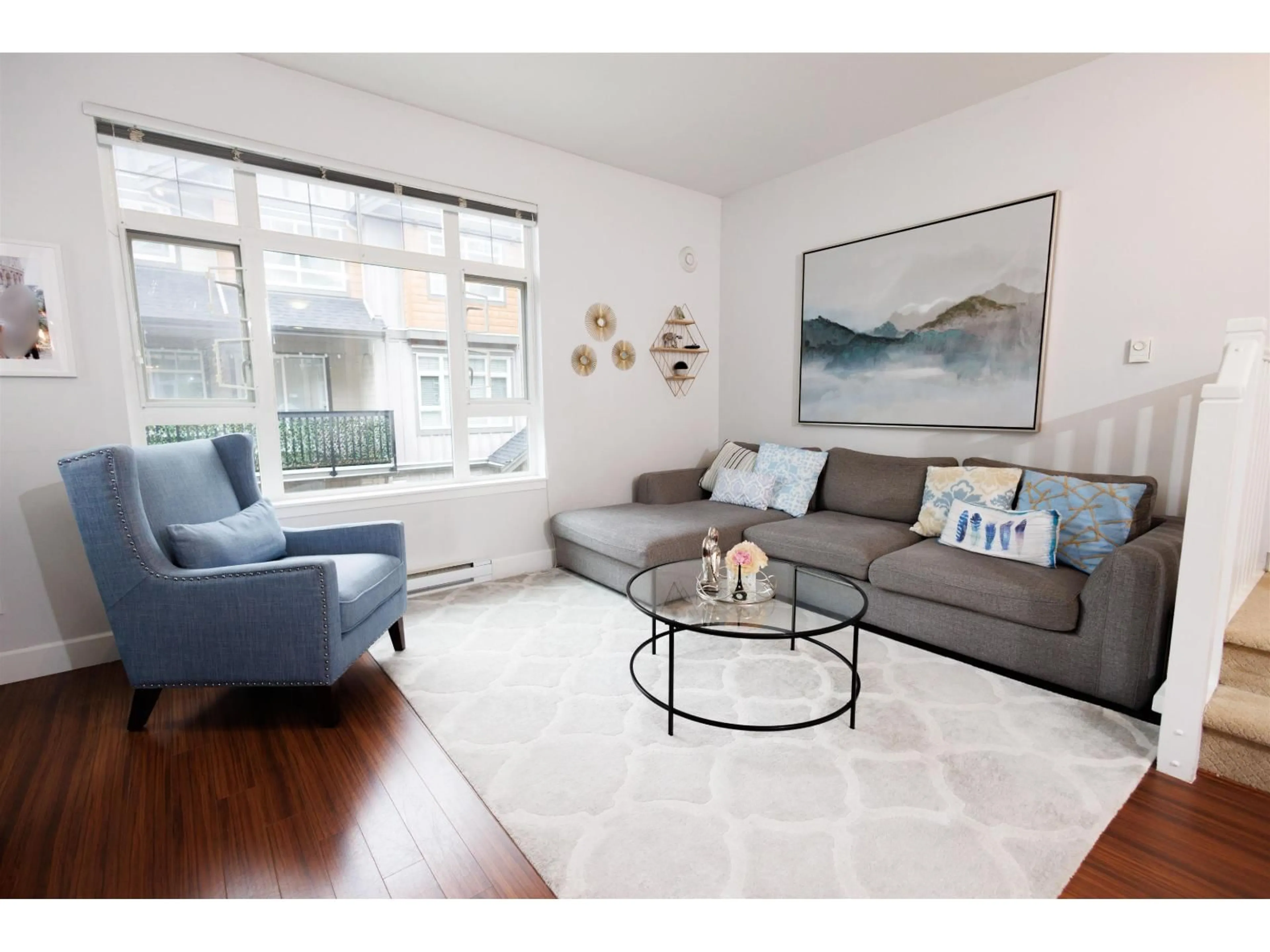 Living room with furniture, wood/laminate floor for 92 - 2979 156 STREET, Surrey British Columbia V3Z8V8