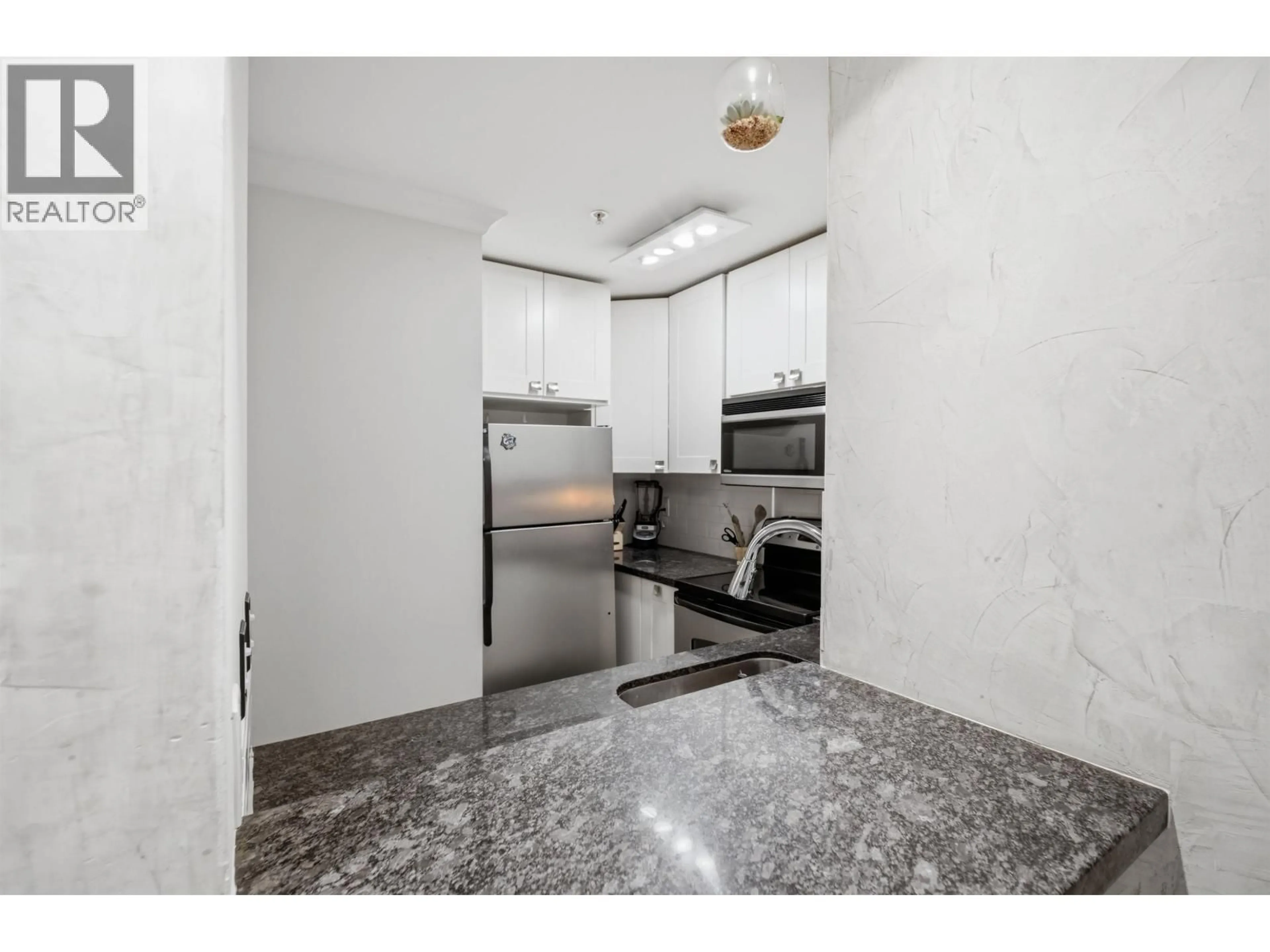Standard kitchen, ceramic/tile floor for 307 - 1230 HARO STREET, Vancouver British Columbia V6E4J9