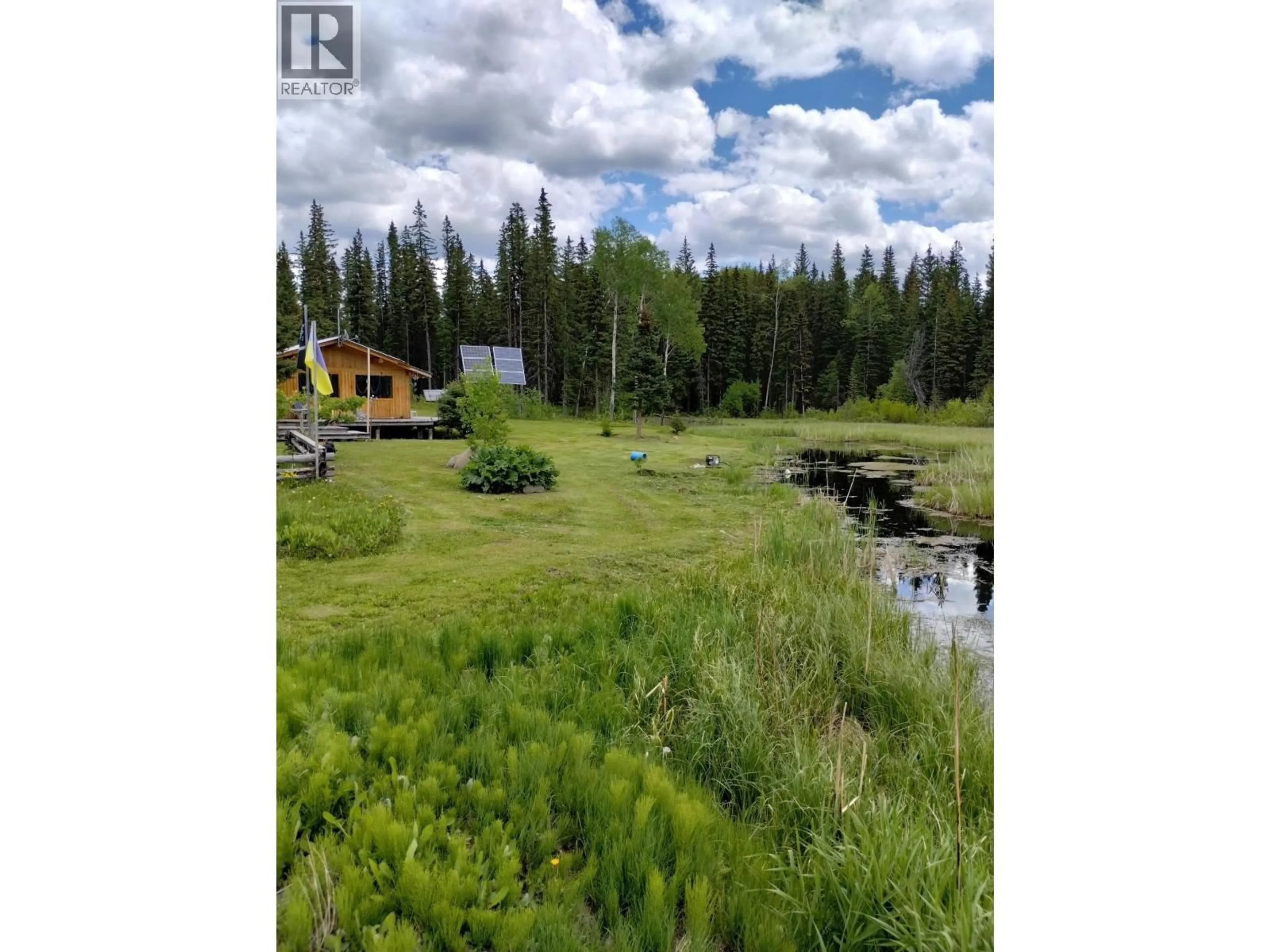 A pic from outside/outdoor area/front of a property/back of a property/a pic from drone, water/lake/river/ocean view for 6534 HORSE LAKE FOREST SERVICE ROAD, 100 Mile House British Columbia V0K2E3
