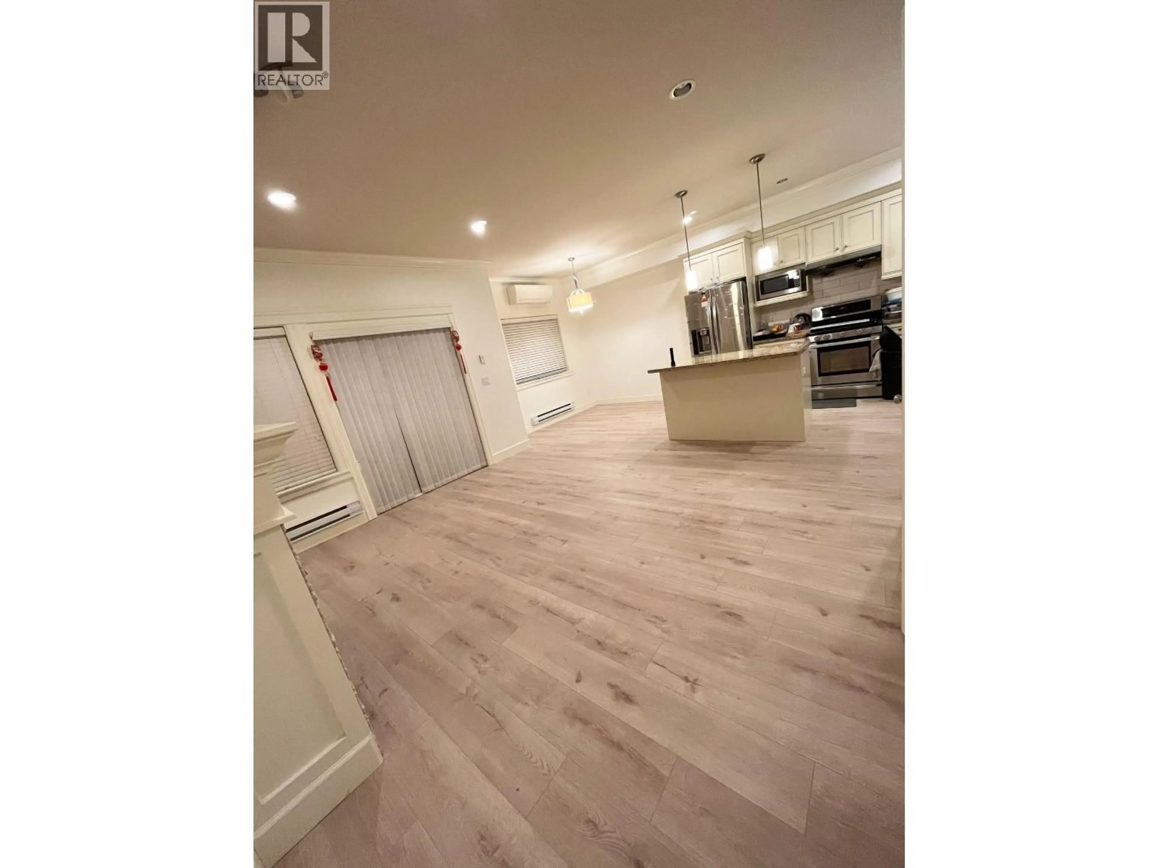 Open concept kitchen, wood/laminate floor for 10 - 8091 WILLIAMS ROAD, Richmond British Columbia V7A1G4