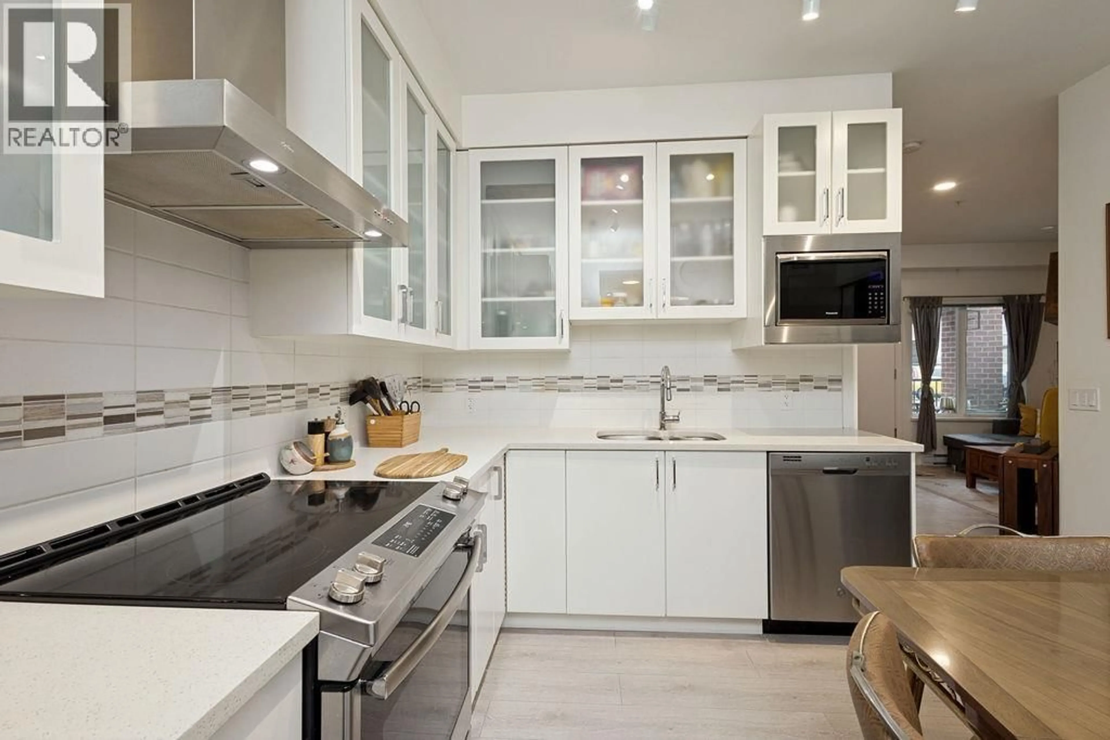 Standard kitchen, ceramic/tile floor for 4860 SLOCAN STREET, Vancouver British Columbia V5R2A3