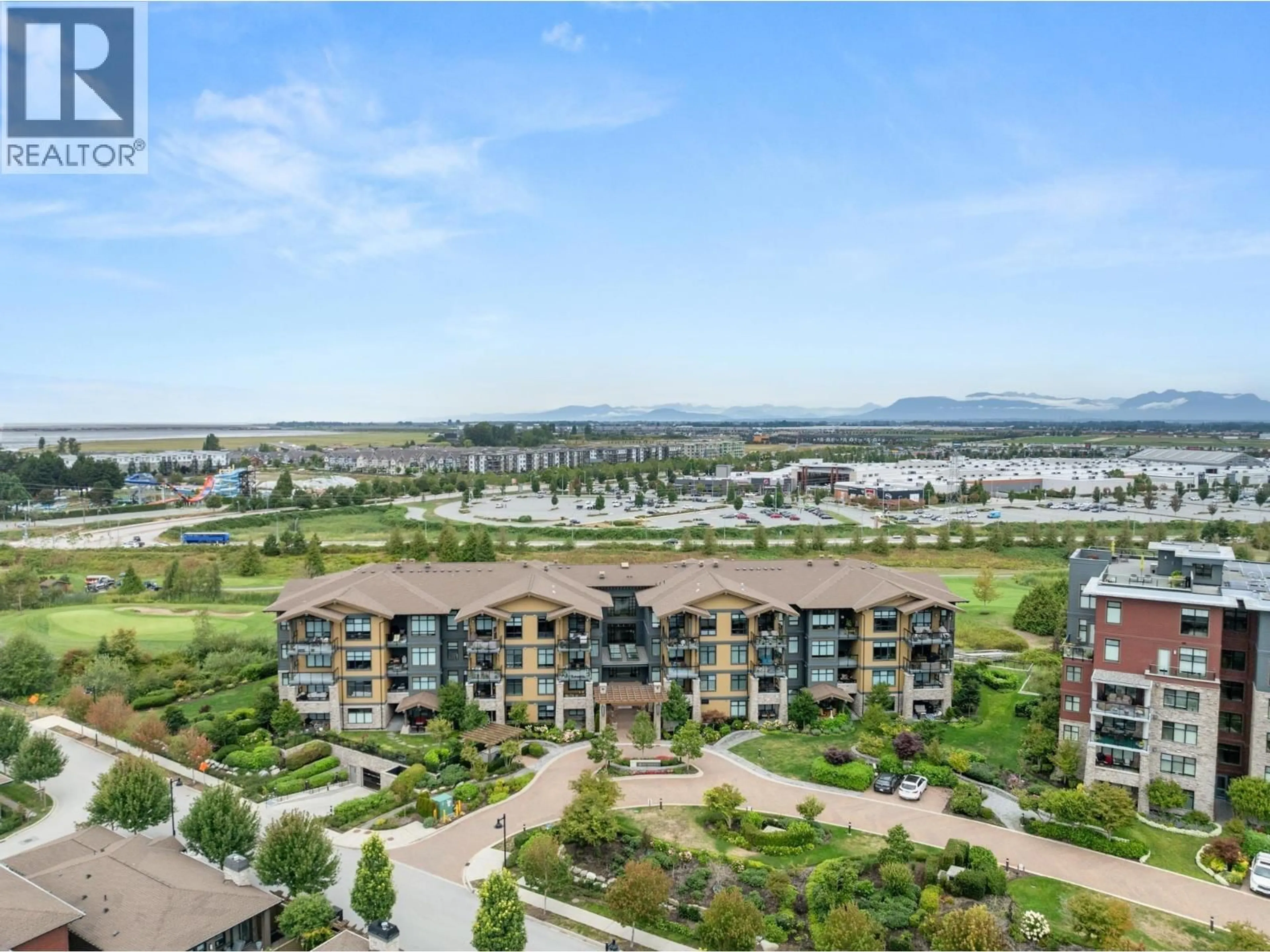 A pic from outside/outdoor area/front of a property/back of a property/a pic from drone, water/lake/river/ocean view for 408 - 4977 SPRINGS BOULEVARD, Delta British Columbia V4M0C1