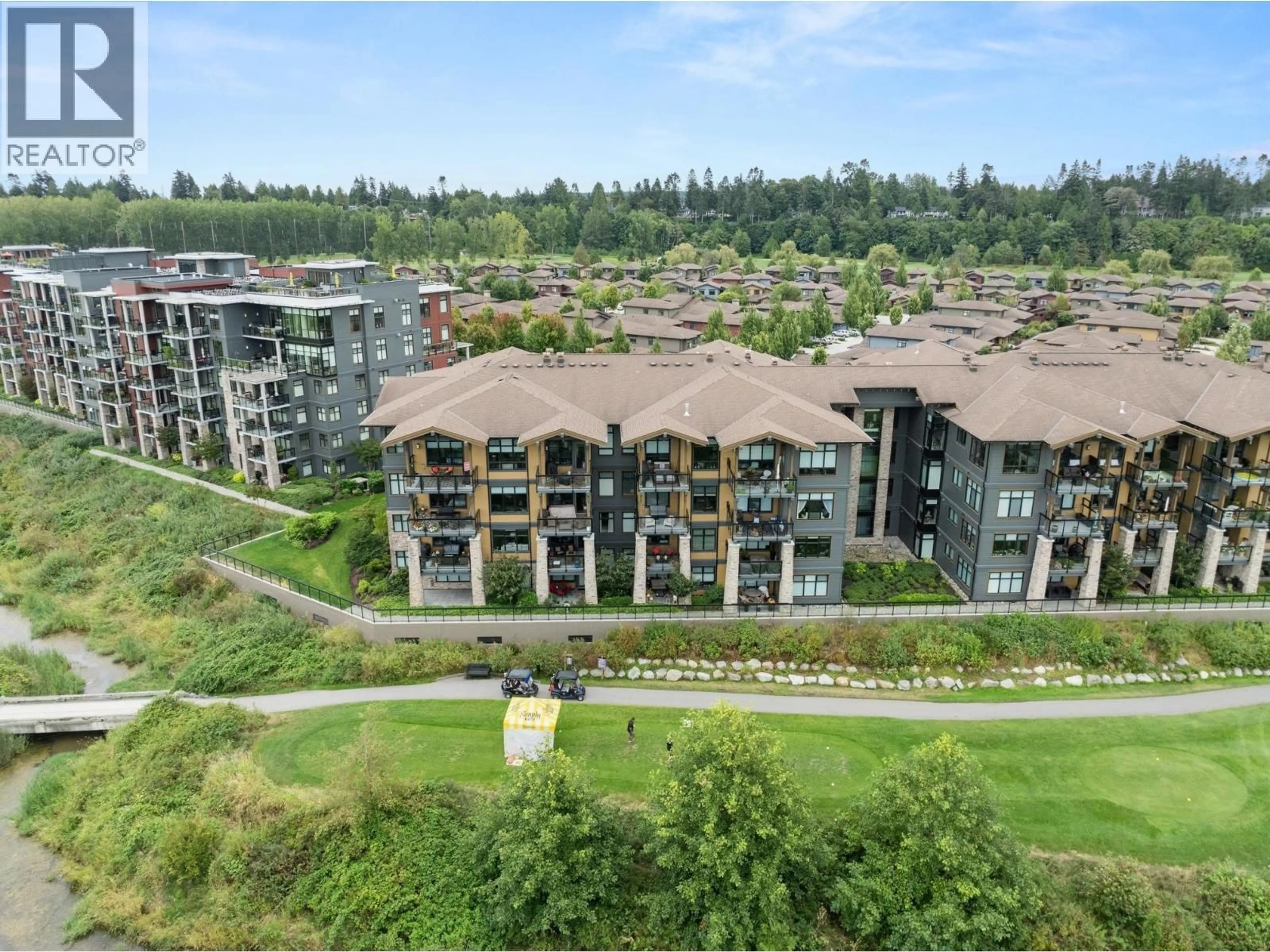 A pic from outside/outdoor area/front of a property/back of a property/a pic from drone, unknown for 408 - 4977 SPRINGS BOULEVARD, Delta British Columbia V4M0C1