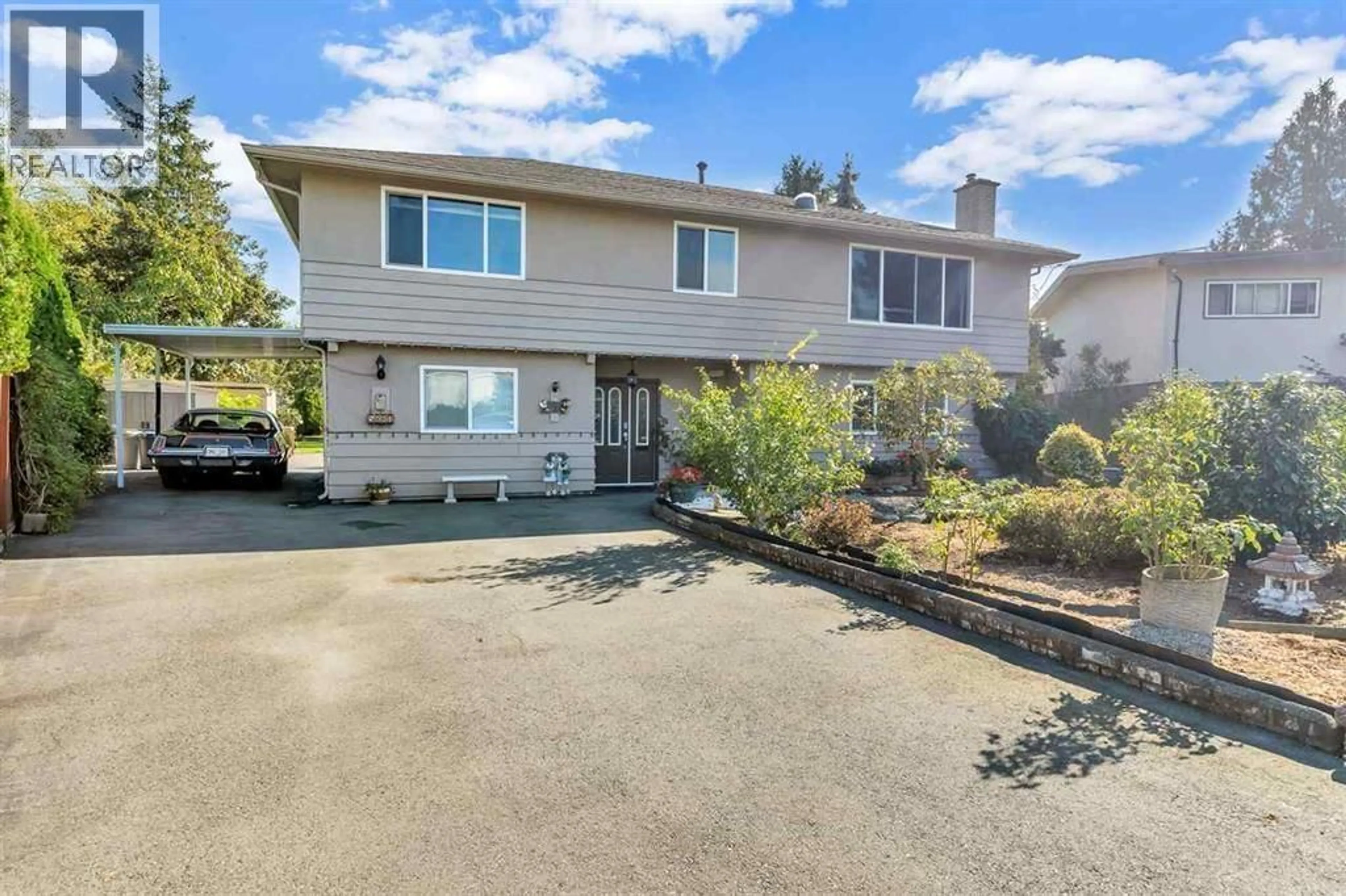 Home with vinyl exterior material, street for 5882 51 AVENUE, Delta British Columbia V4K2C1