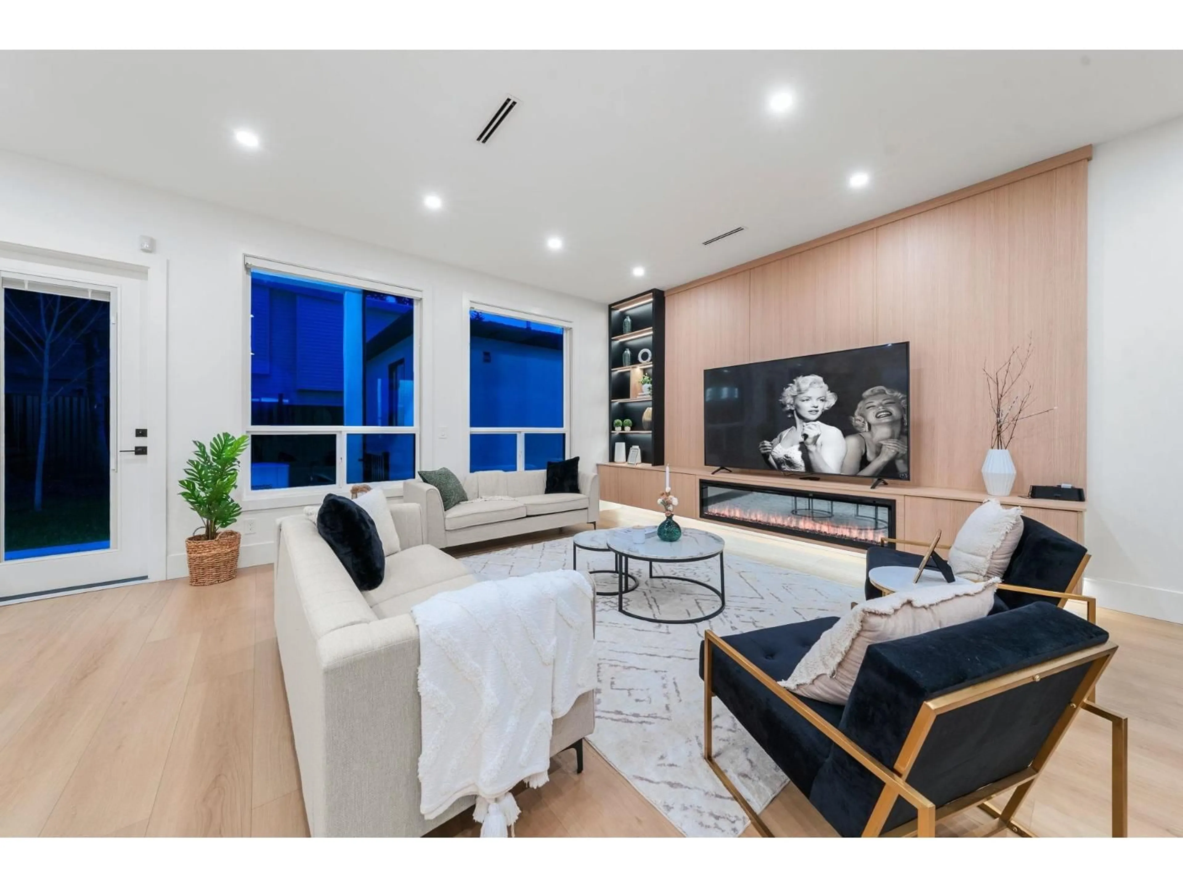 Living room with furniture, wood/laminate floor for 11648 94A AVENUE, Delta British Columbia V4C3S3