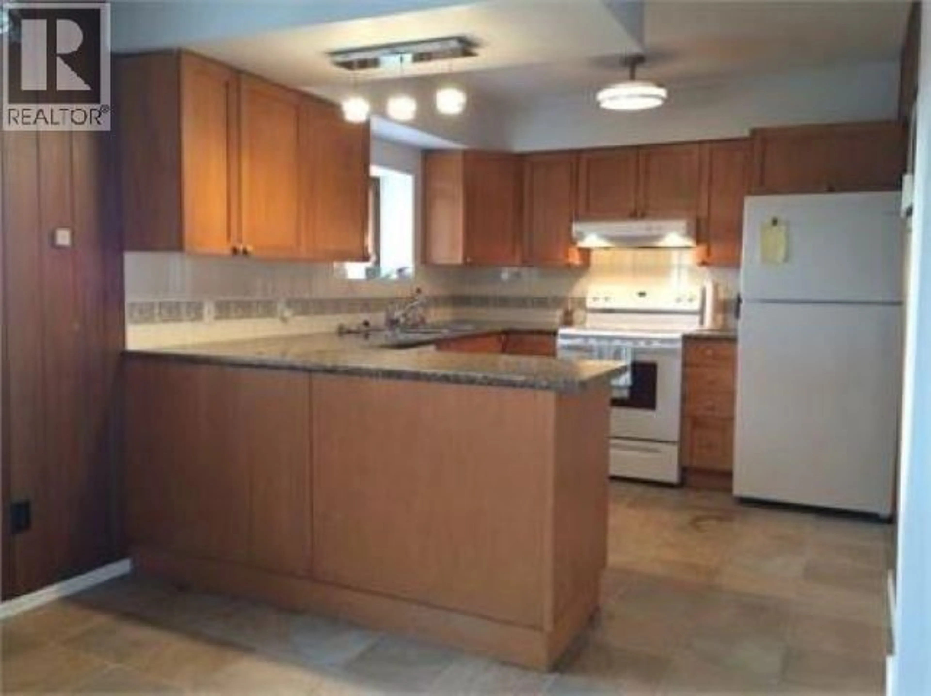 Standard kitchen, ceramic/tile floor for 7487 HIGHLAND DRIVE, Fort Nelson British Columbia V0C1R0