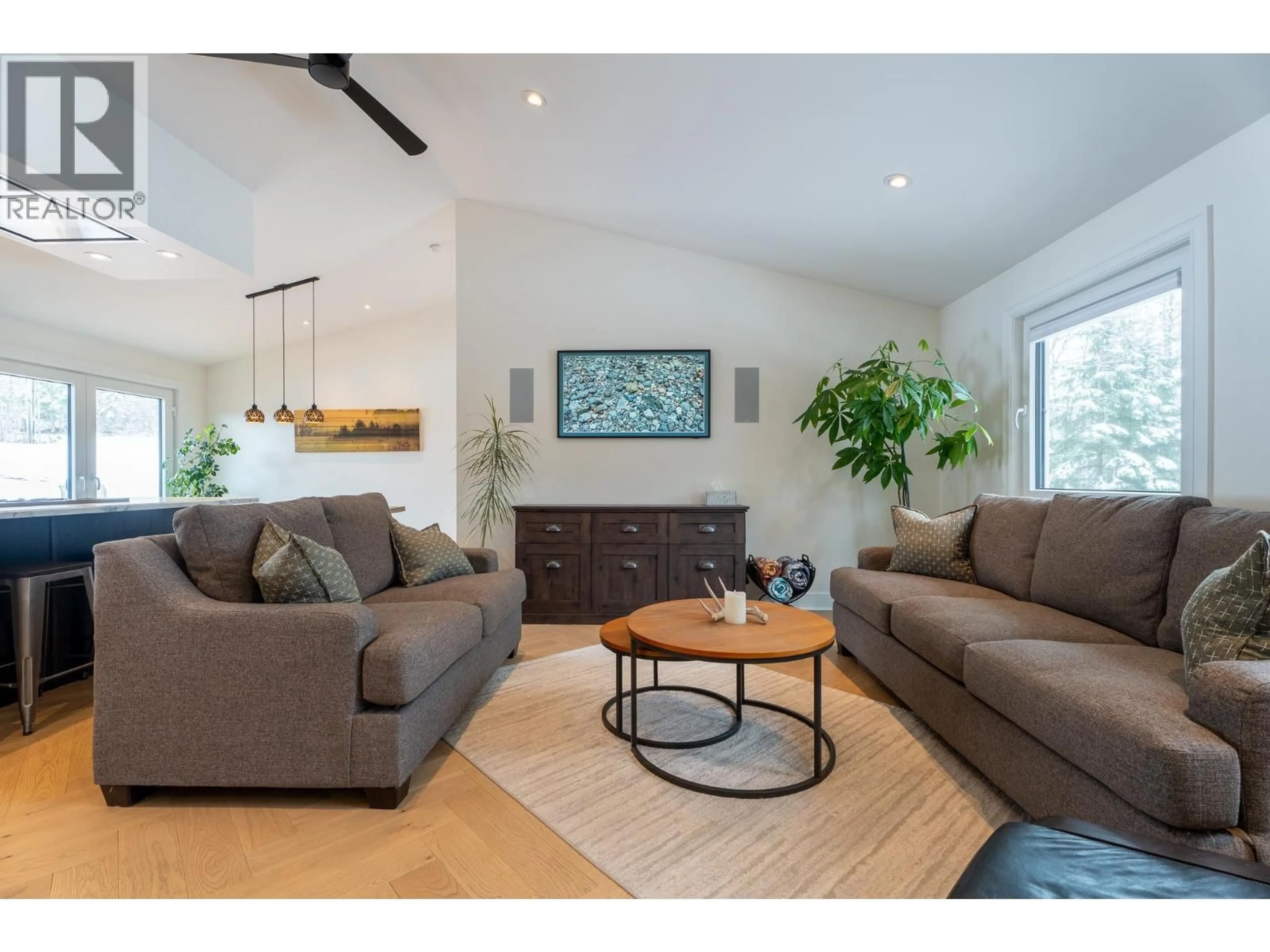 Living room with furniture, wood/laminate floor for 1282 FOREMAN ROAD, Prince George British Columbia V2K5C5