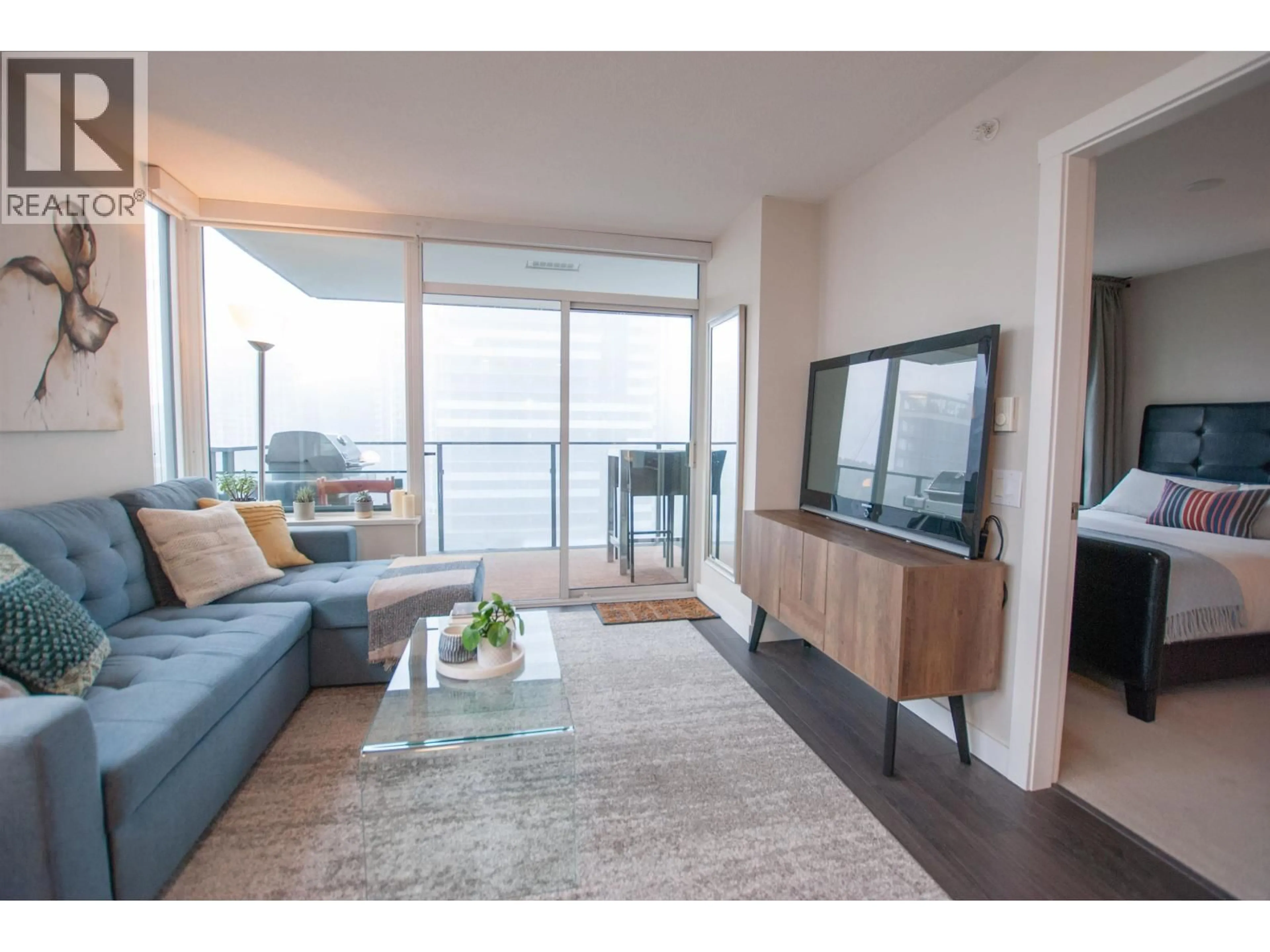 Living room with furniture, unknown for 1507 - 602 COMO LAKE AVENUE, Coquitlam British Columbia V3J0G2