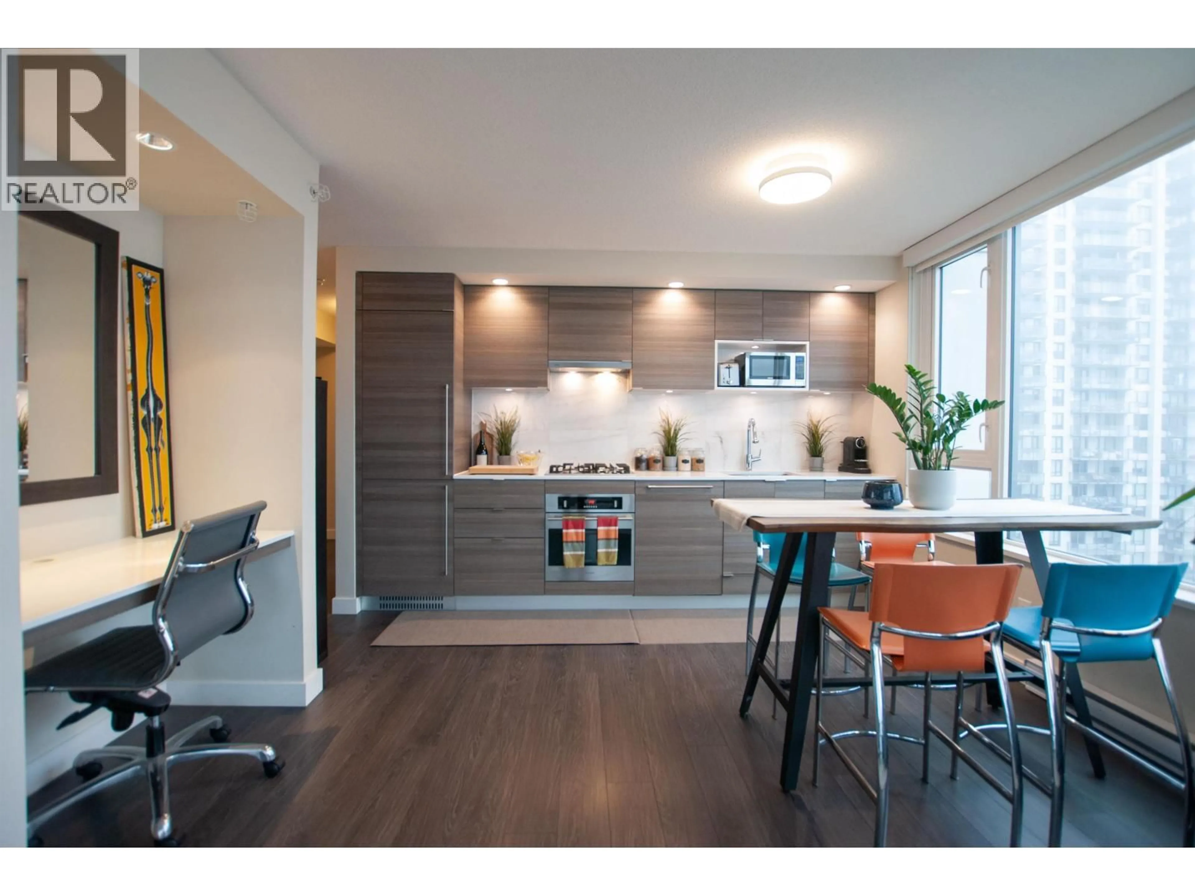 Open concept kitchen, wood/laminate floor for 1507 - 602 COMO LAKE AVENUE, Coquitlam British Columbia V3J0G2