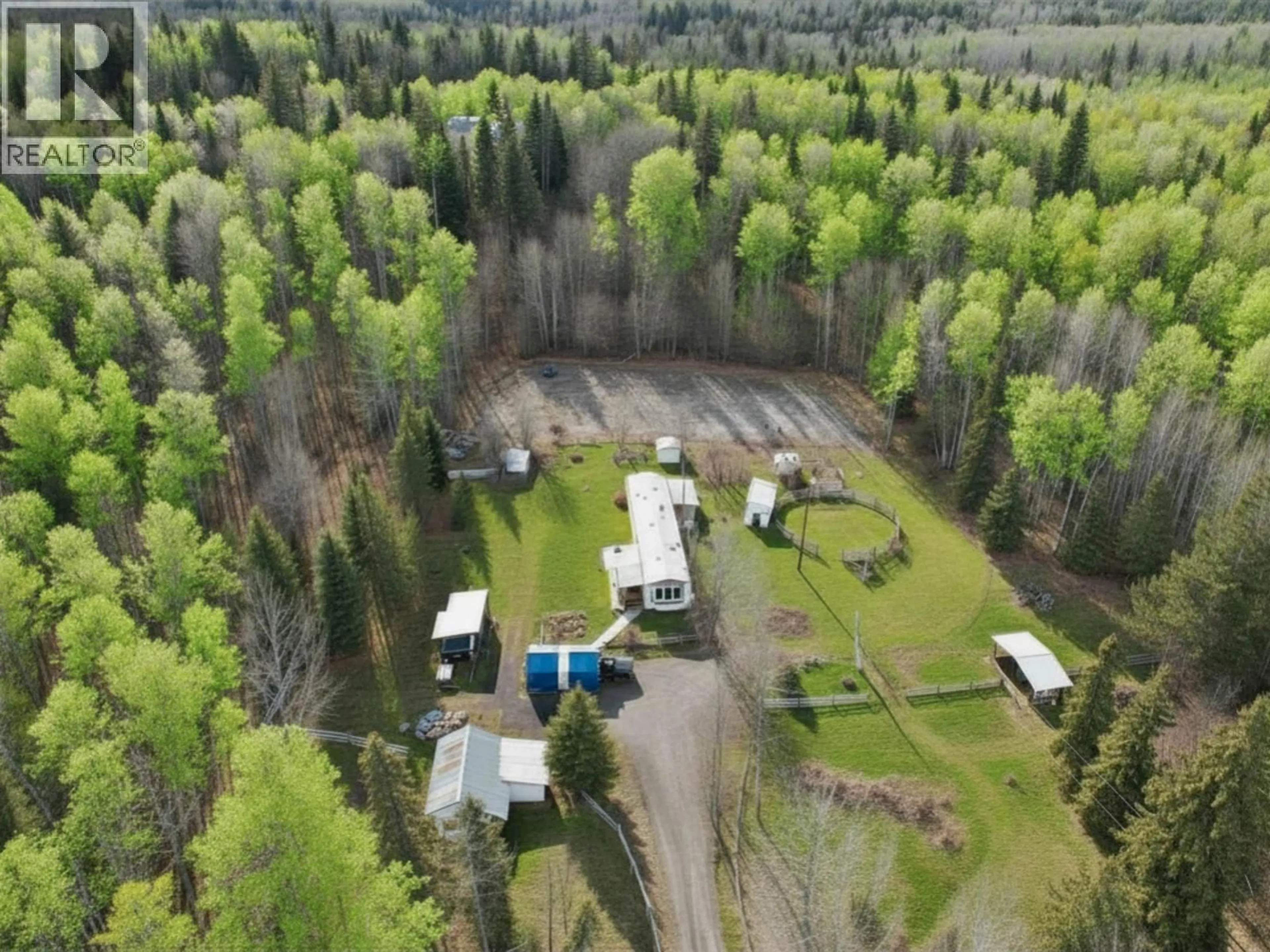 A pic from outside/outdoor area/front of a property/back of a property/a pic from drone, forest/trees view for 1533 WINWORD ROAD, Quesnel British Columbia V2J7G3