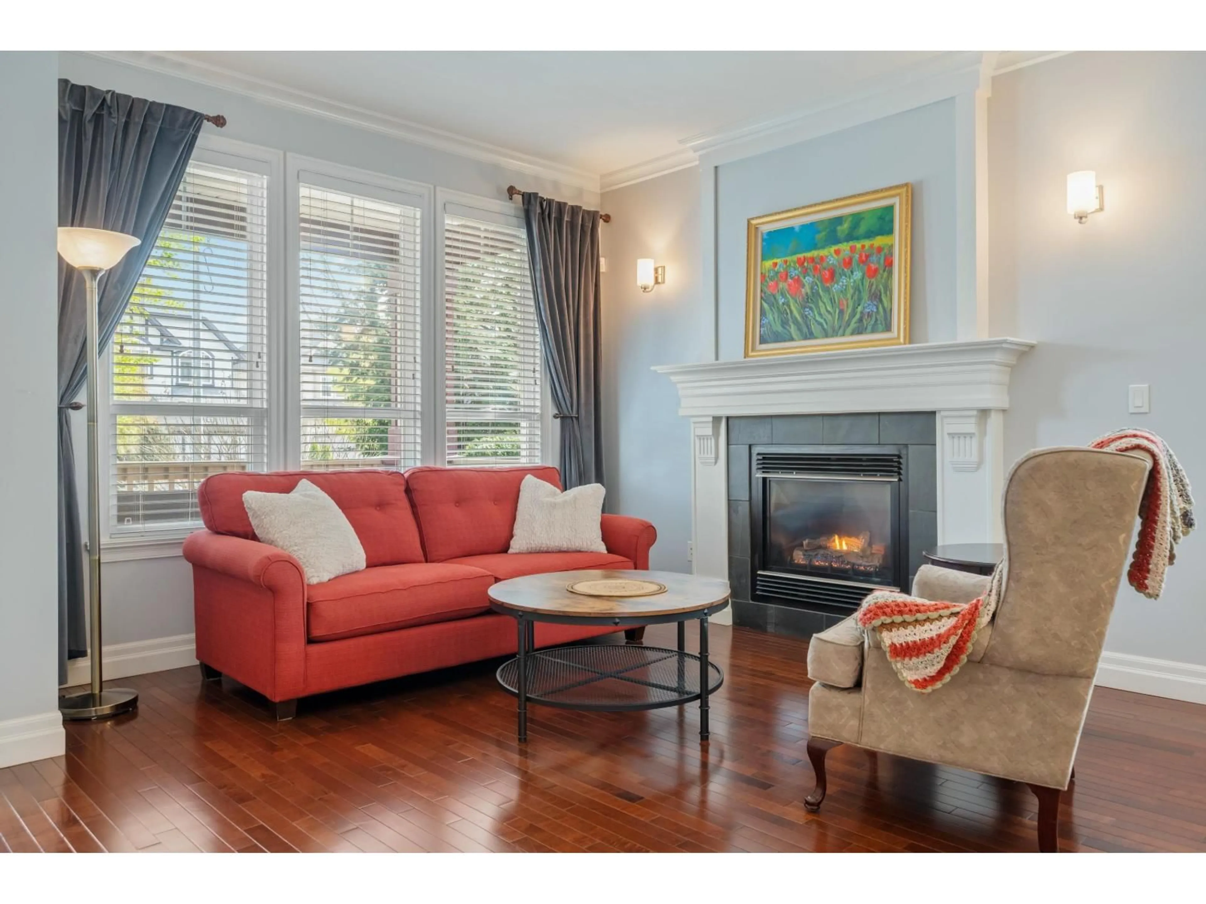 Living room with furniture, wood/laminate floor for 7267 201 STREET, Langley British Columbia V2Y3G2