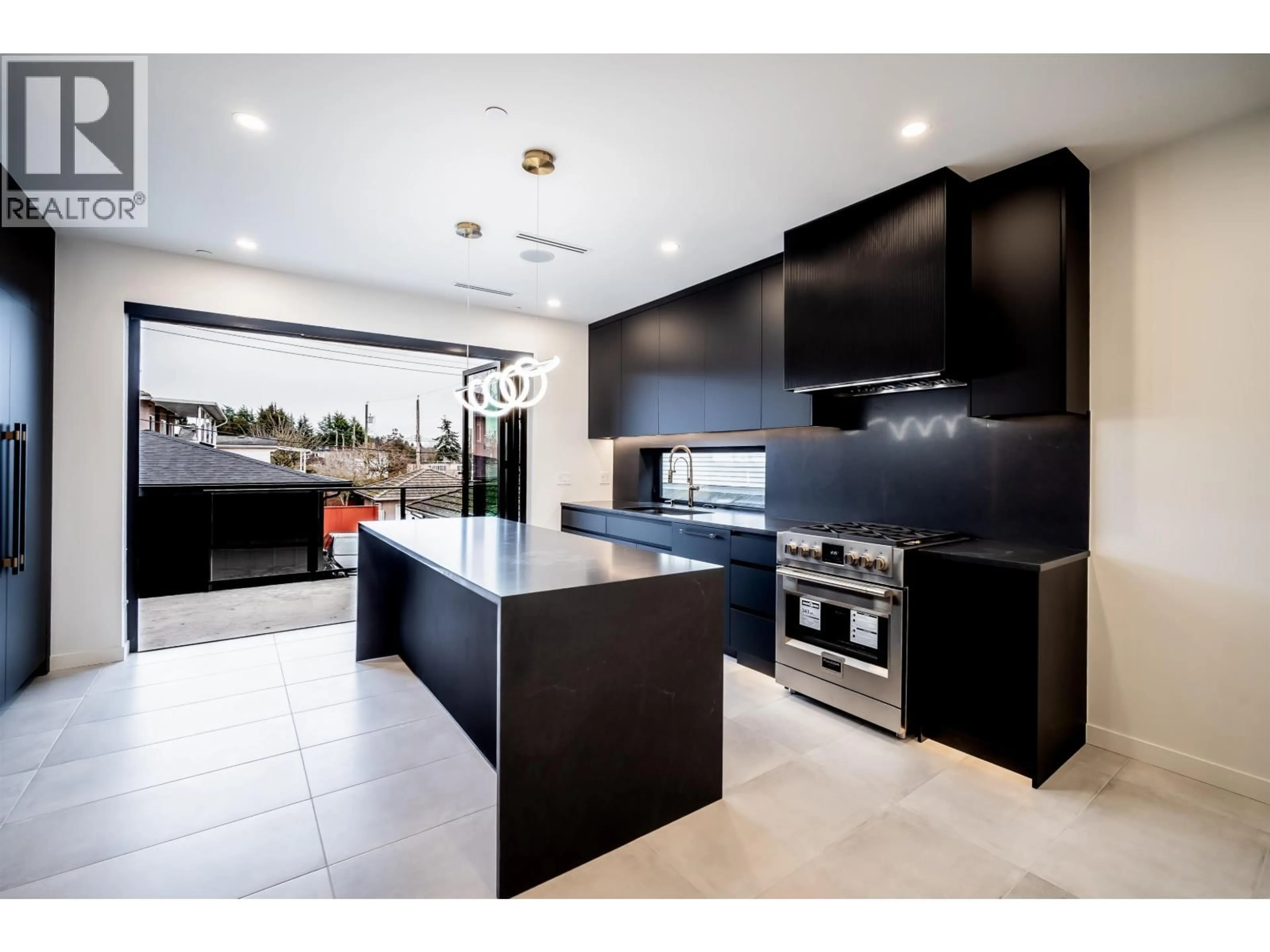 Contemporary kitchen, ceramic/tile floor for 7962 INVERNESS STREET, Vancouver British Columbia V5X4H7