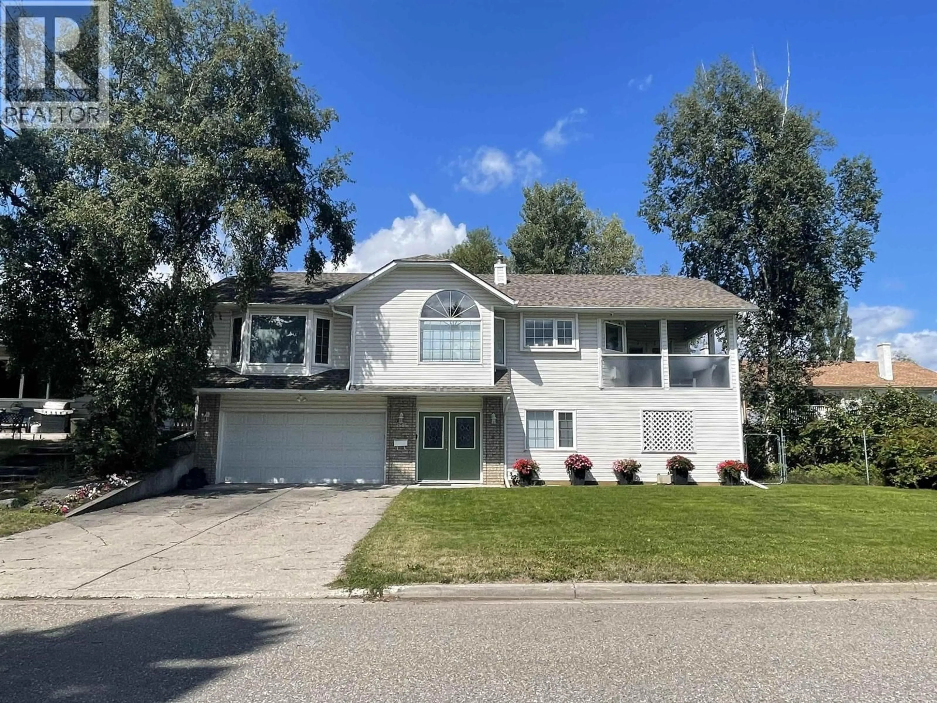 Home with vinyl exterior material, street for 1585 EDMONTON STREET, Prince George British Columbia V2M1X5