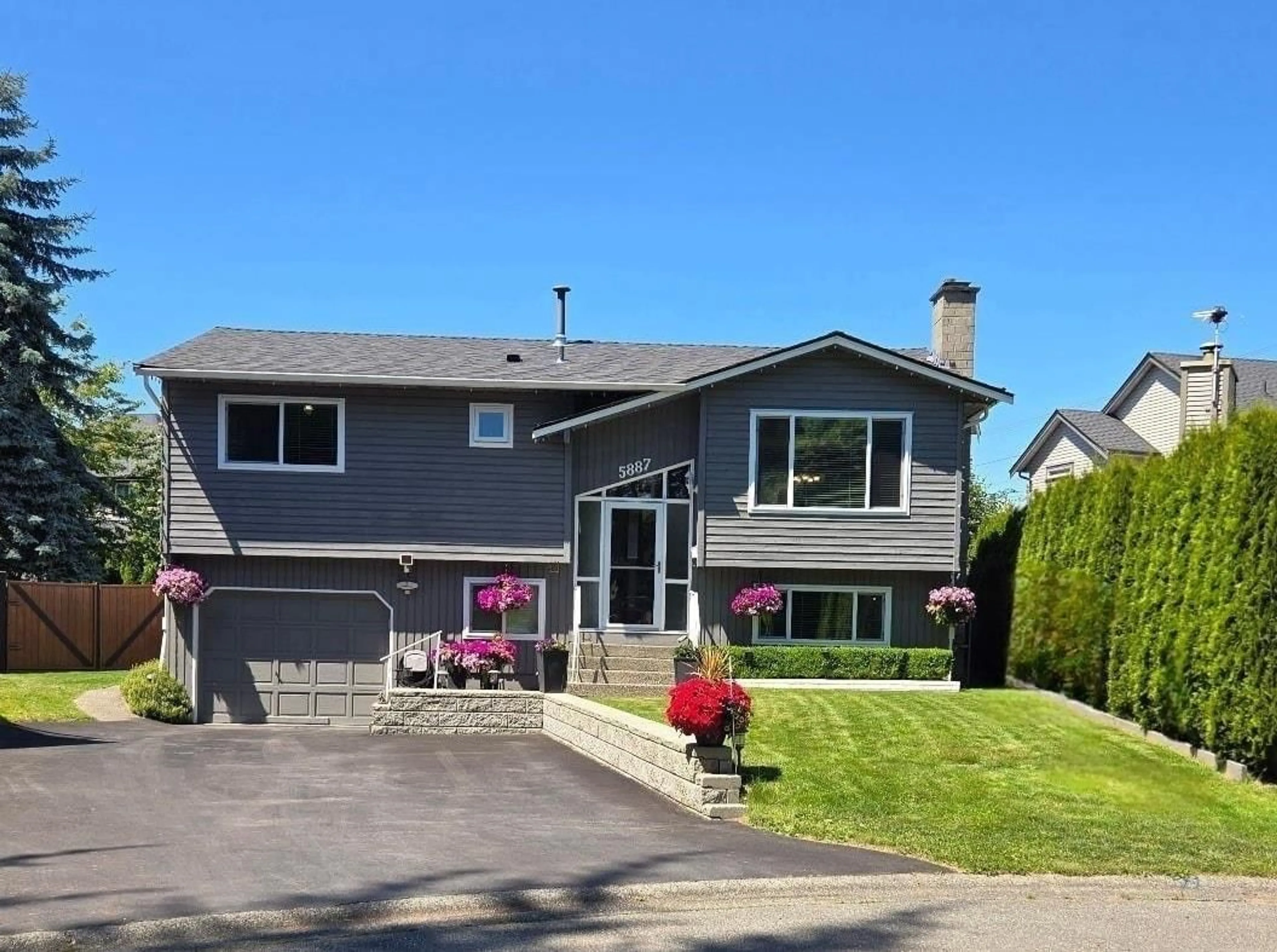 Home with vinyl exterior material, street for 5887 184B STREET, Surrey British Columbia V3S5S9