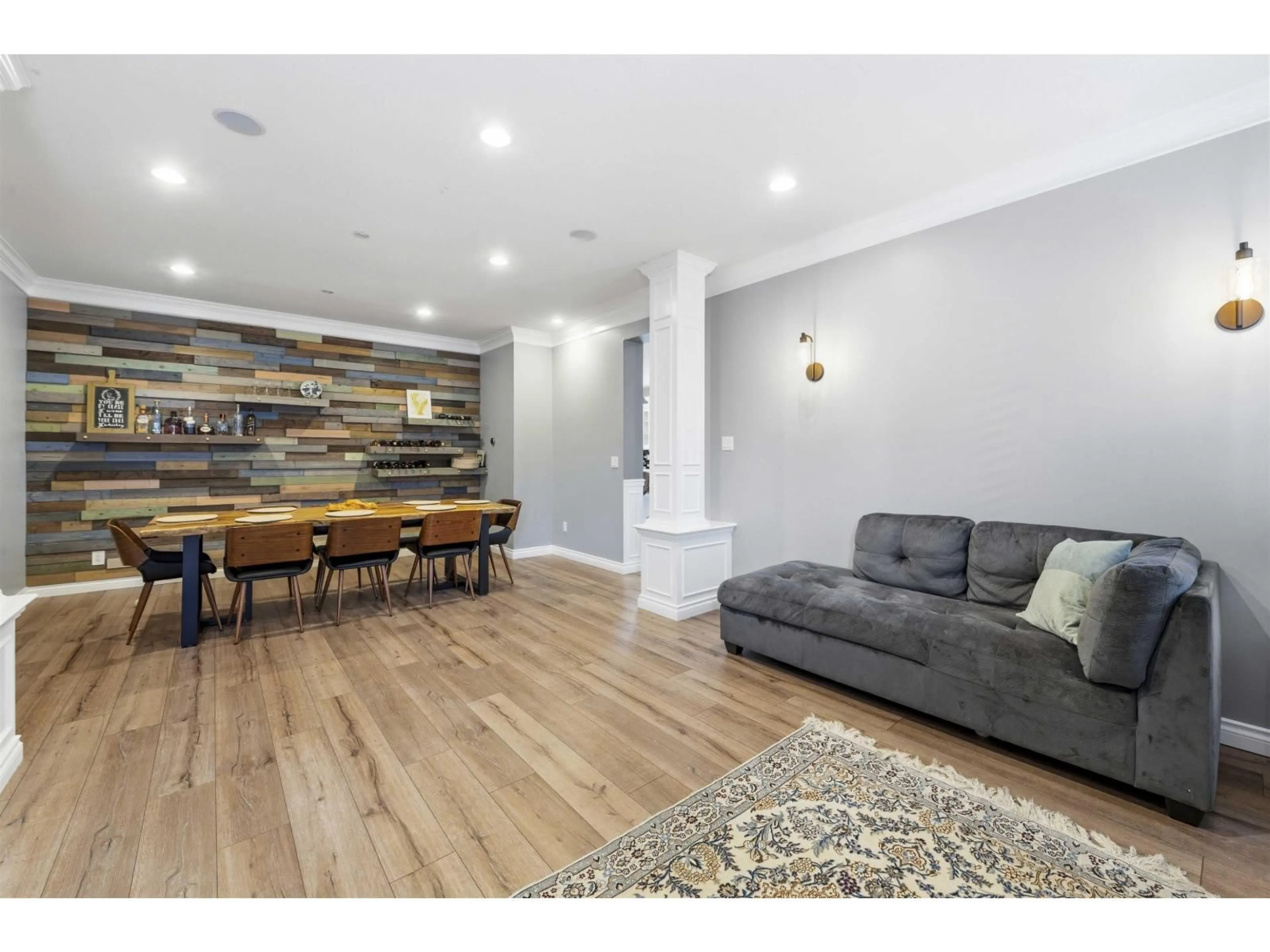 Living room with furniture, wood/laminate floor for 21670 89 AVENUE, Langley British Columbia V1M4C6