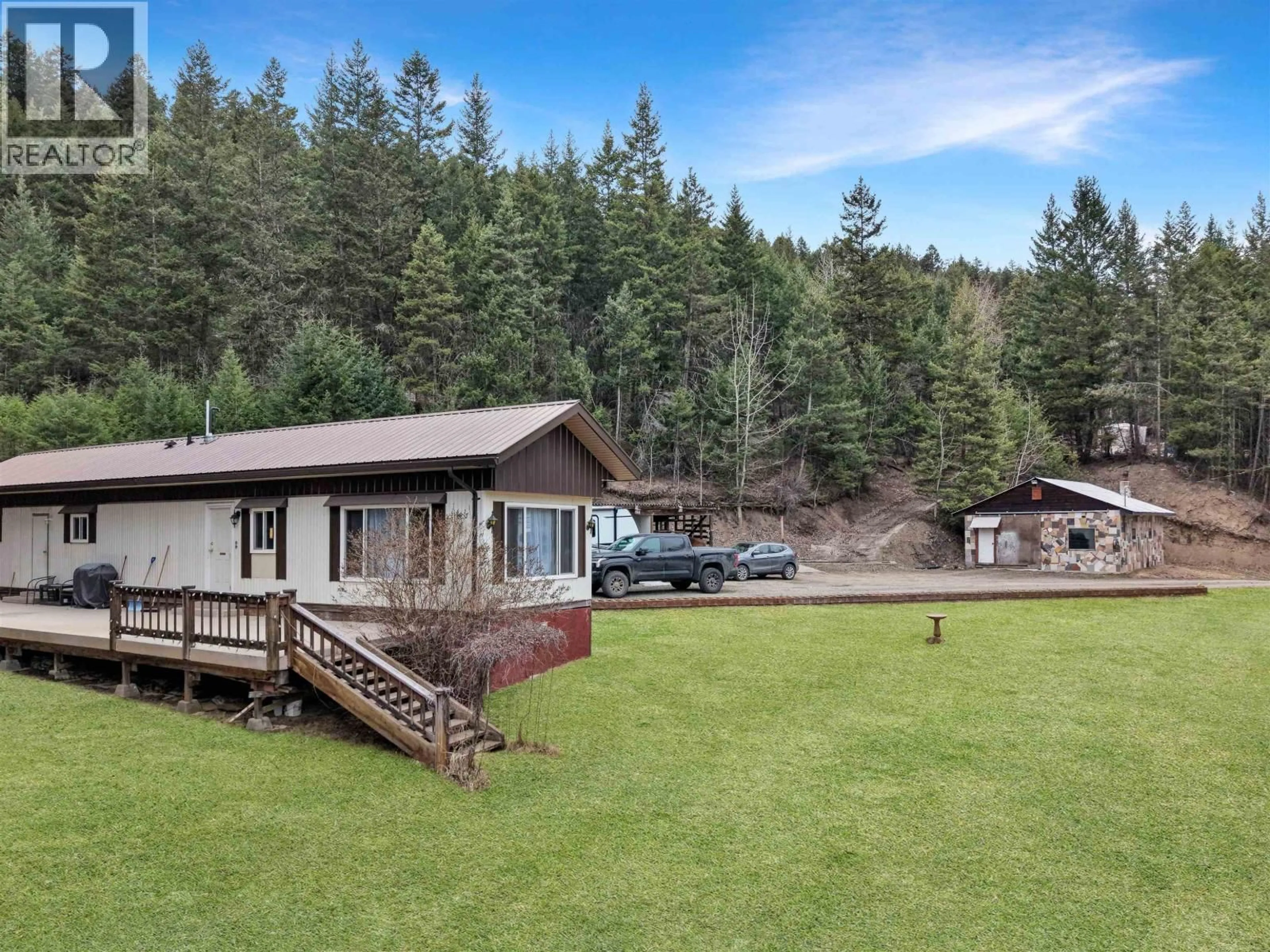 A pic from outside/outdoor area/front of a property/back of a property/a pic from drone, unknown for 913 HODGSON ROAD, Williams Lake British Columbia V2G4Y3