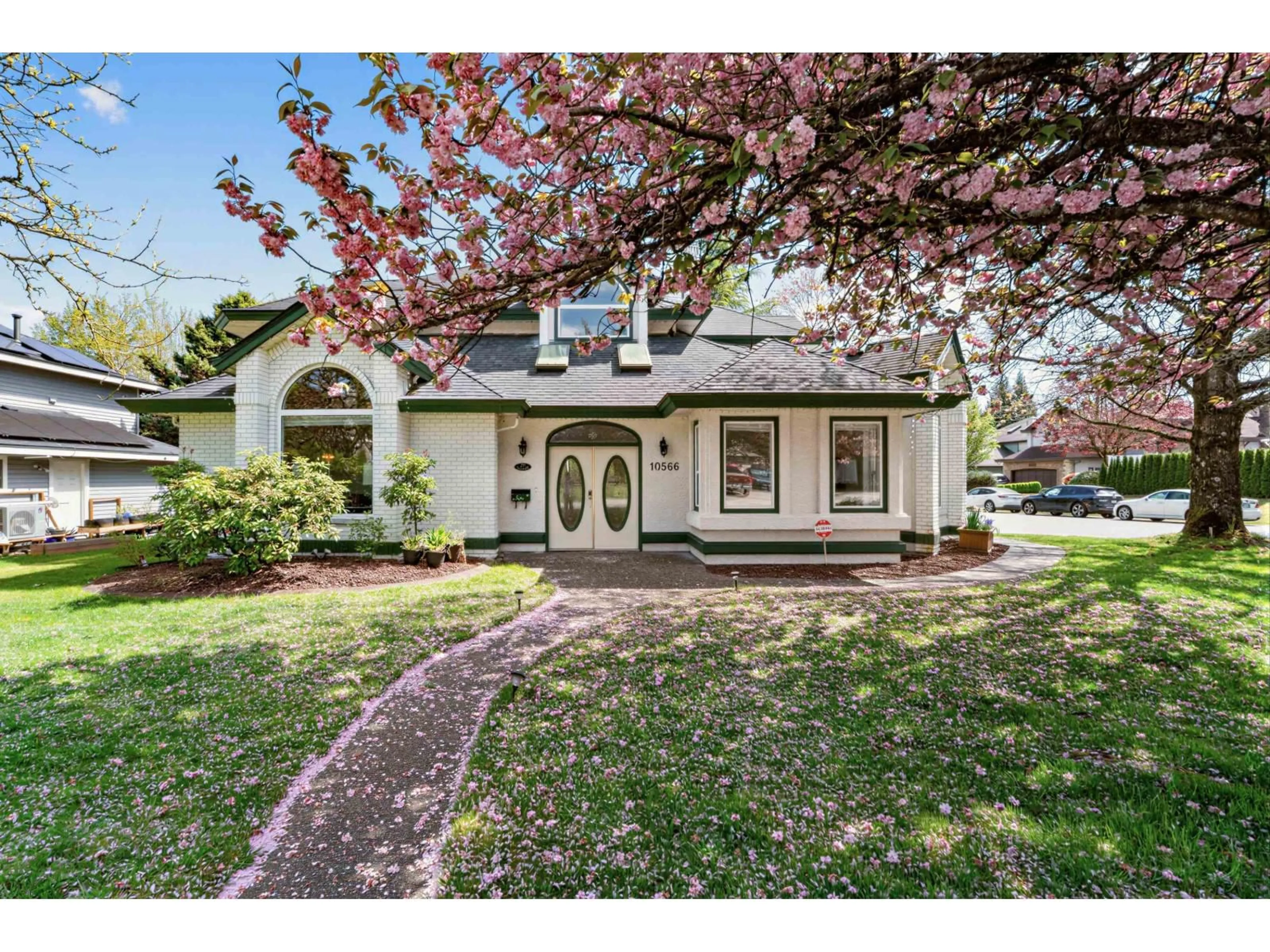 Home with vinyl exterior material, street for 10566 168 STREET, Surrey British Columbia V4N1R9