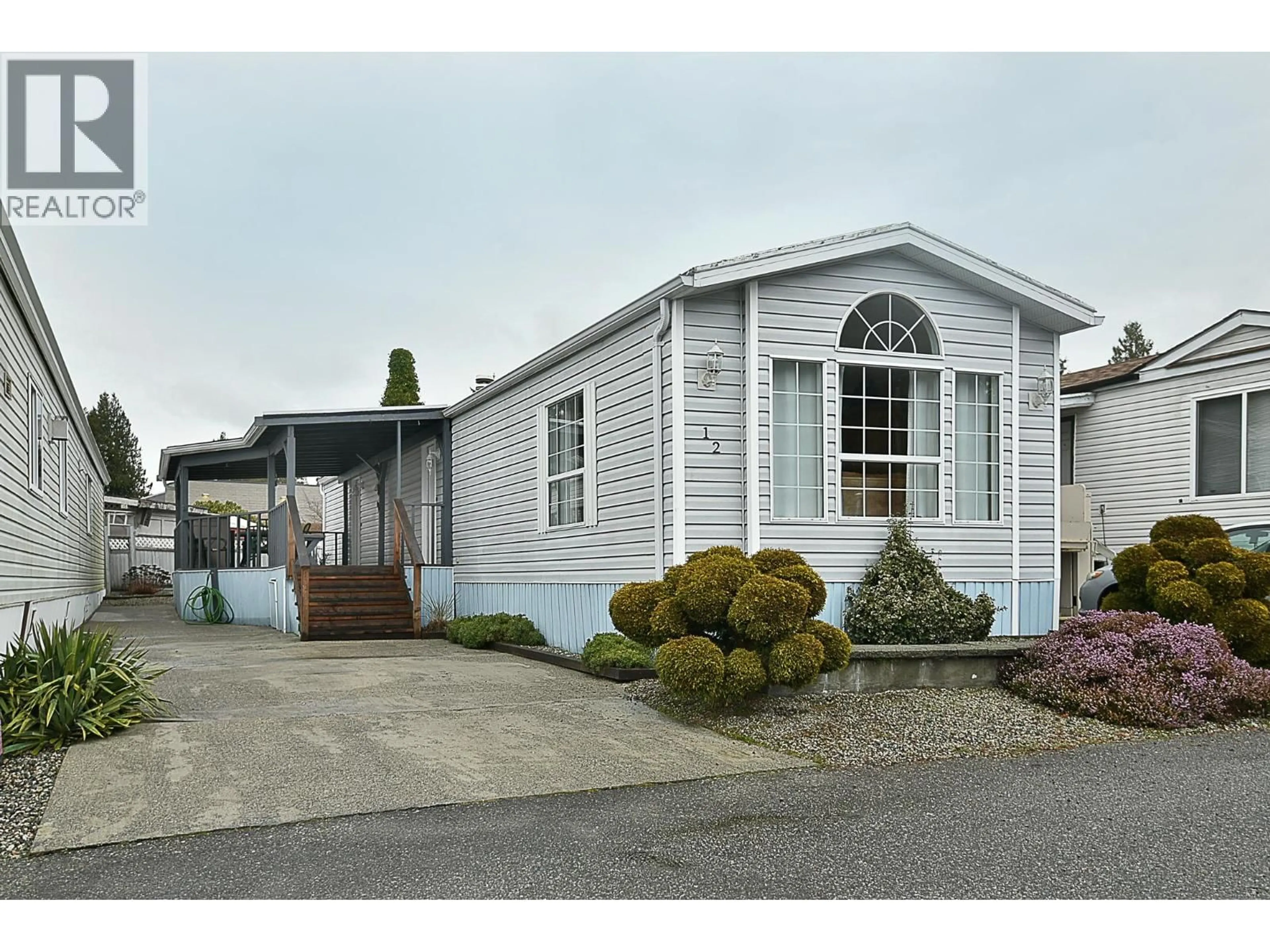 Home with vinyl exterior material, street for 12 - 5575 MASON ROAD, Sechelt British Columbia V7Z0K9
