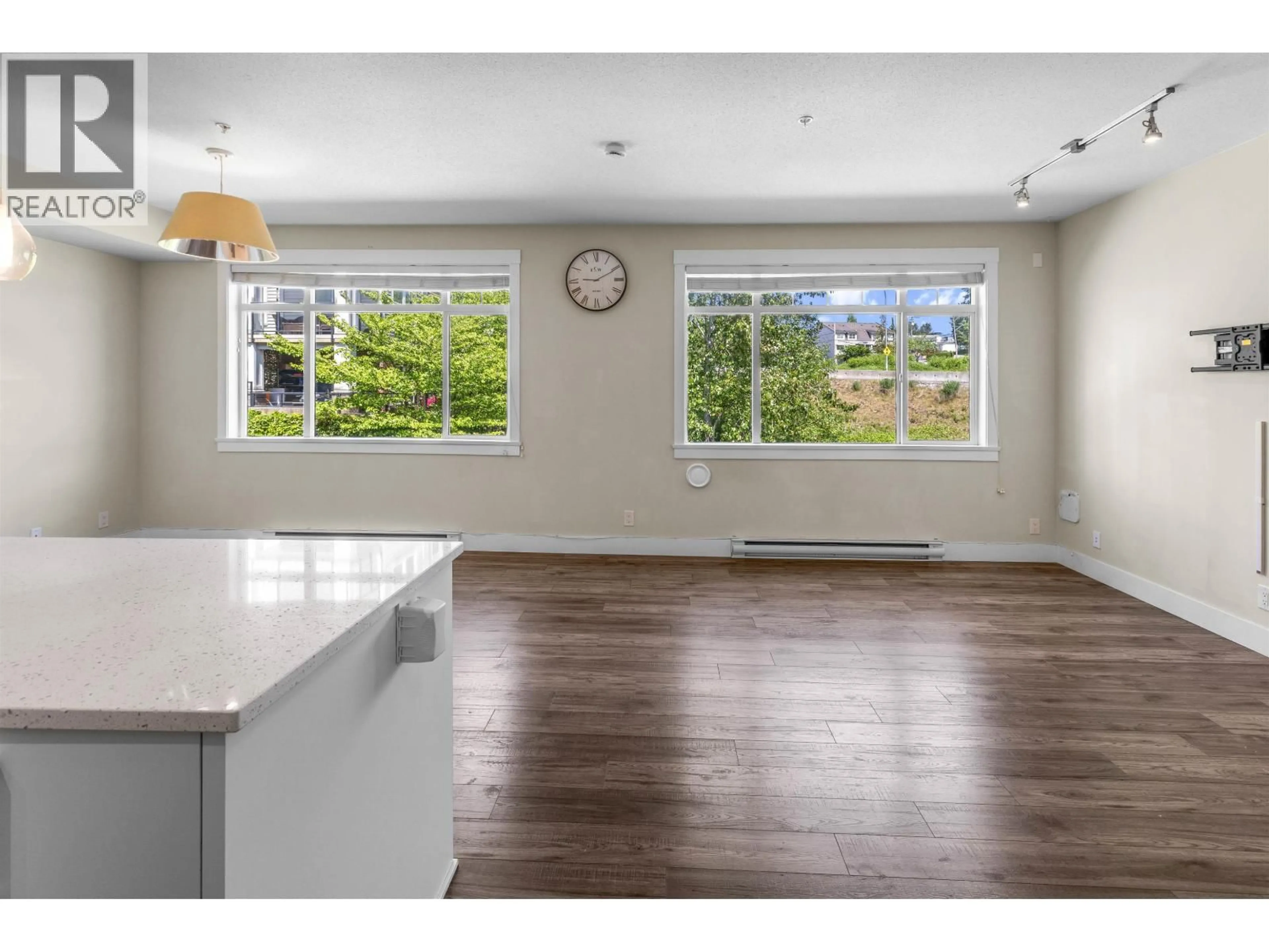 Open concept kitchen, wood/laminate floor for 311 - 22327 RIVER ROAD, Maple Ridge British Columbia V2X9C8