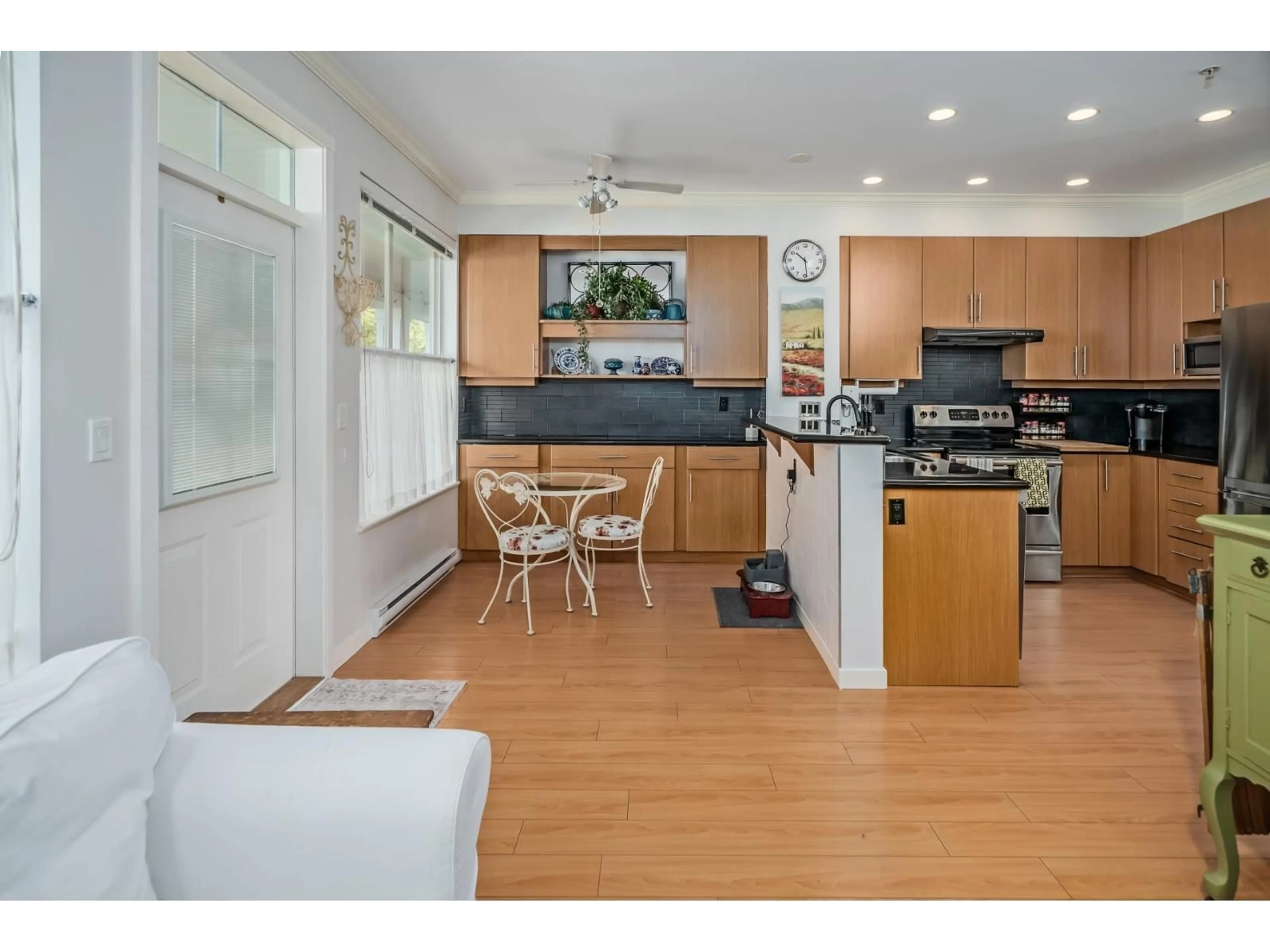 Open concept kitchen, wood/laminate floor for 17 - 20460 66 AVENUE, Langley British Columbia V2Y3B6