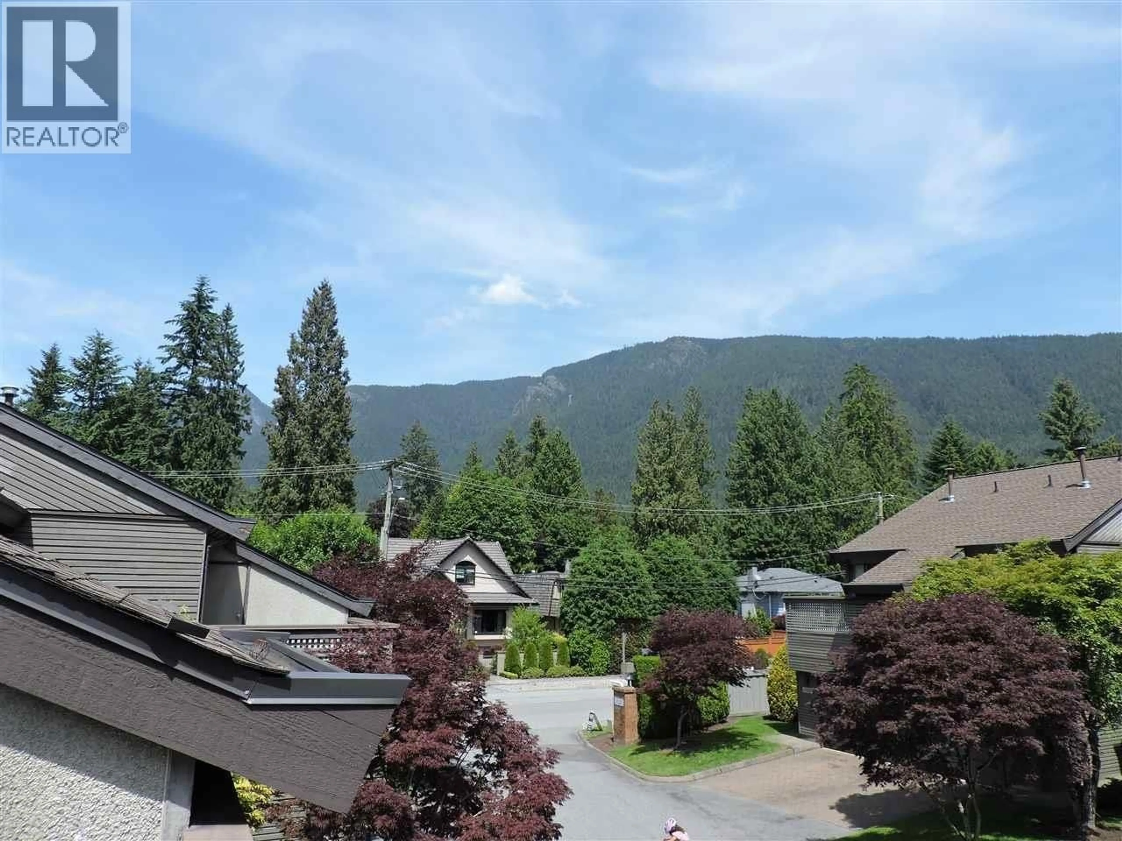 A pic from outside/outdoor area/front of a property/back of a property/a pic from drone, mountain view for 1147 MONTROYAL BOULEVARD, North Vancouver British Columbia V7R2H8