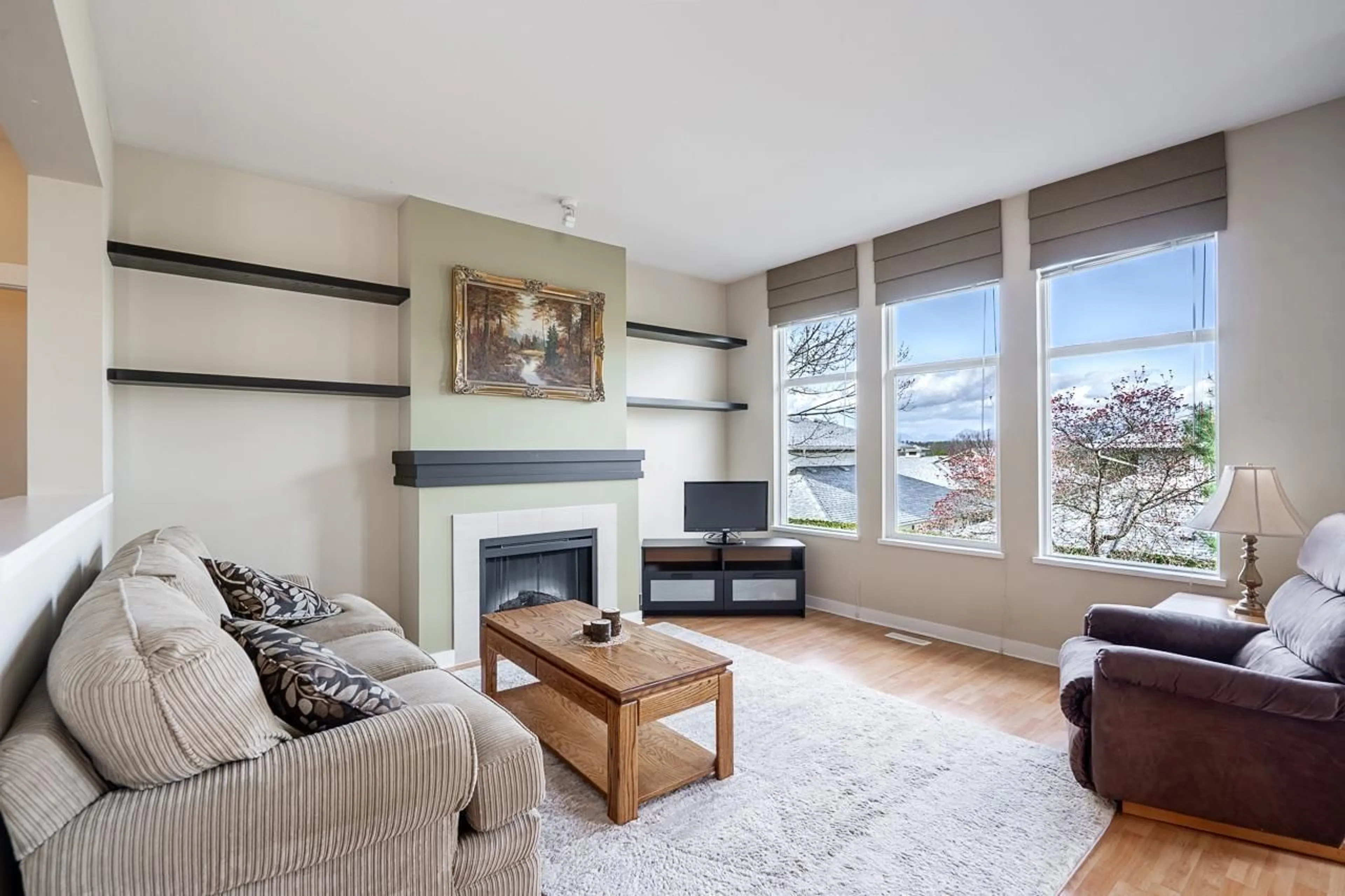 Living room with furniture, wood/laminate floor for 53 - 15188 62A AVENUE, Surrey British Columbia V3S1W7
